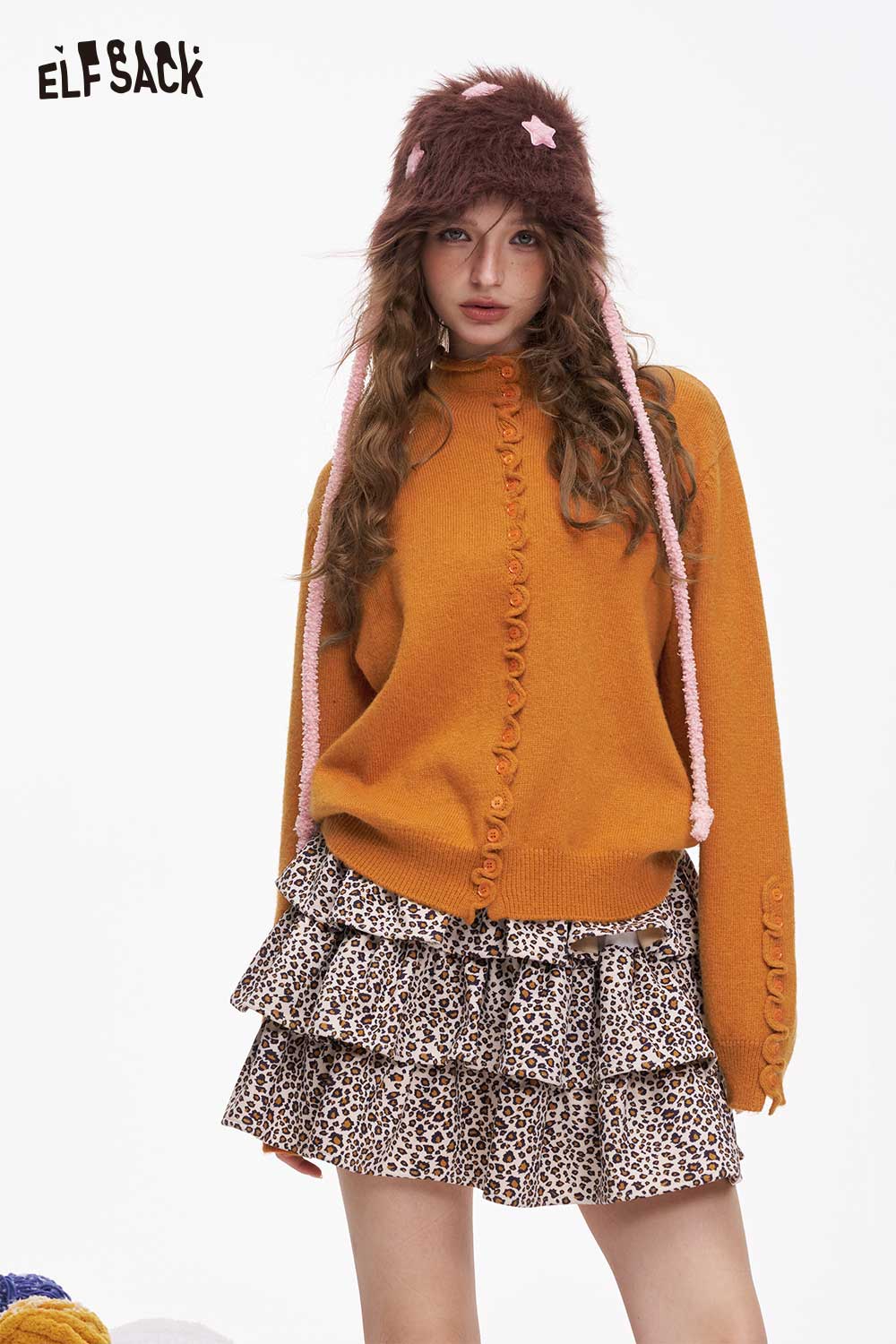ELFSACK Minimalist Ruffle Button Knitwear in Orange with Stylish Ruffles and Cozy Design