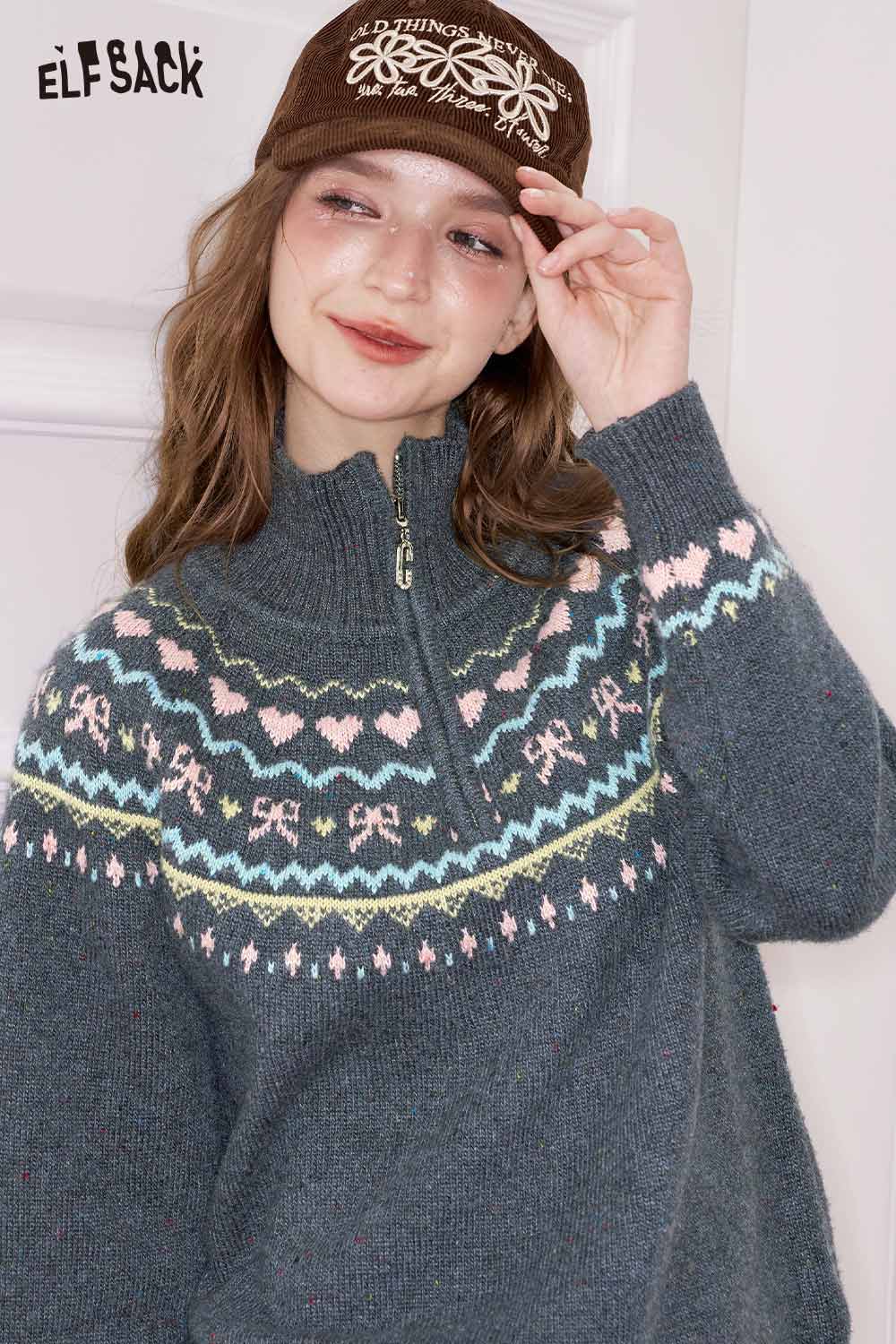 Cozy ELFSACK minimalist stripe zipper sweater with a colorful fair isle pattern and mock neck design