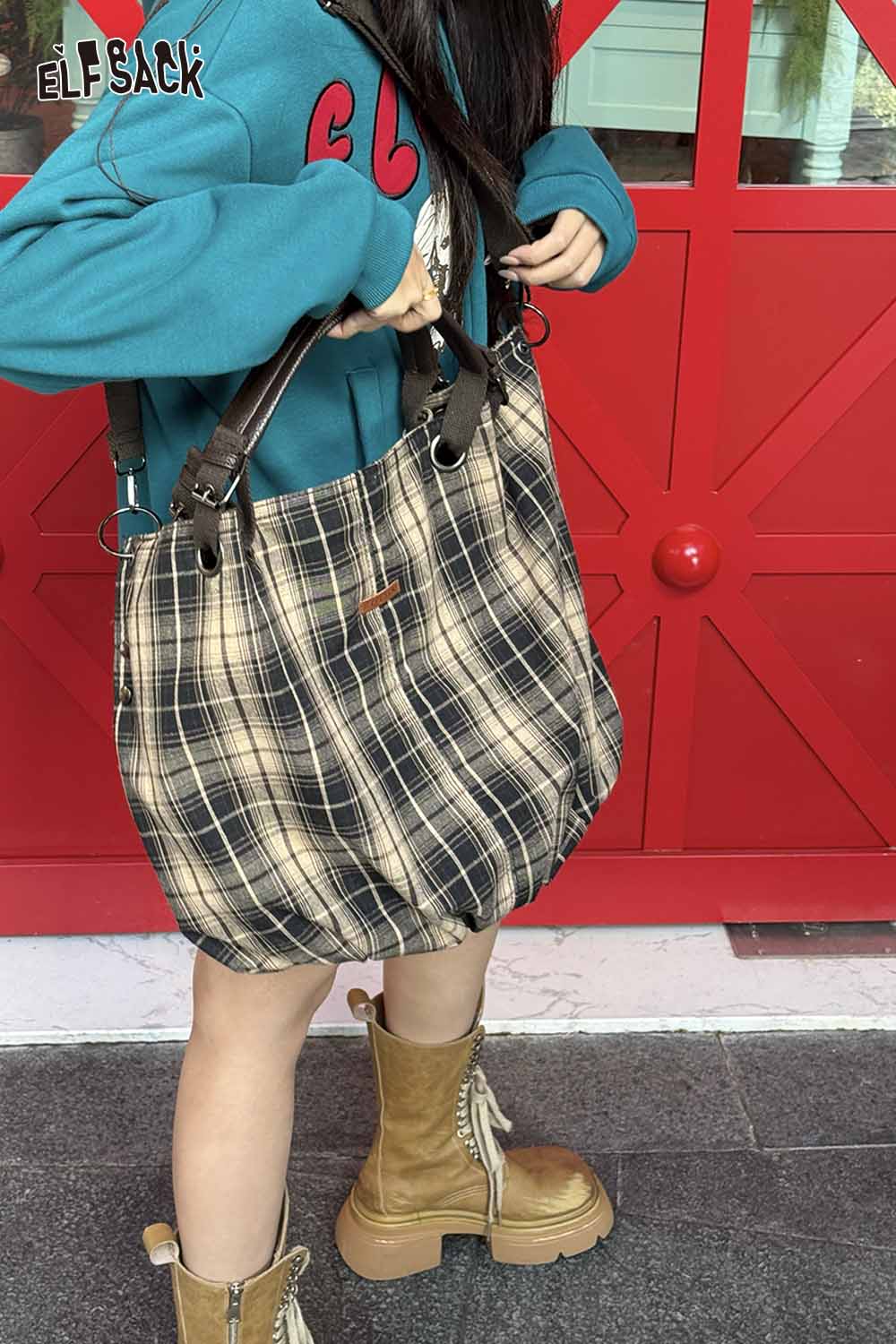 ELFSACK minimalist striped crossbody tote bag stylishly carried with a plaid outfit