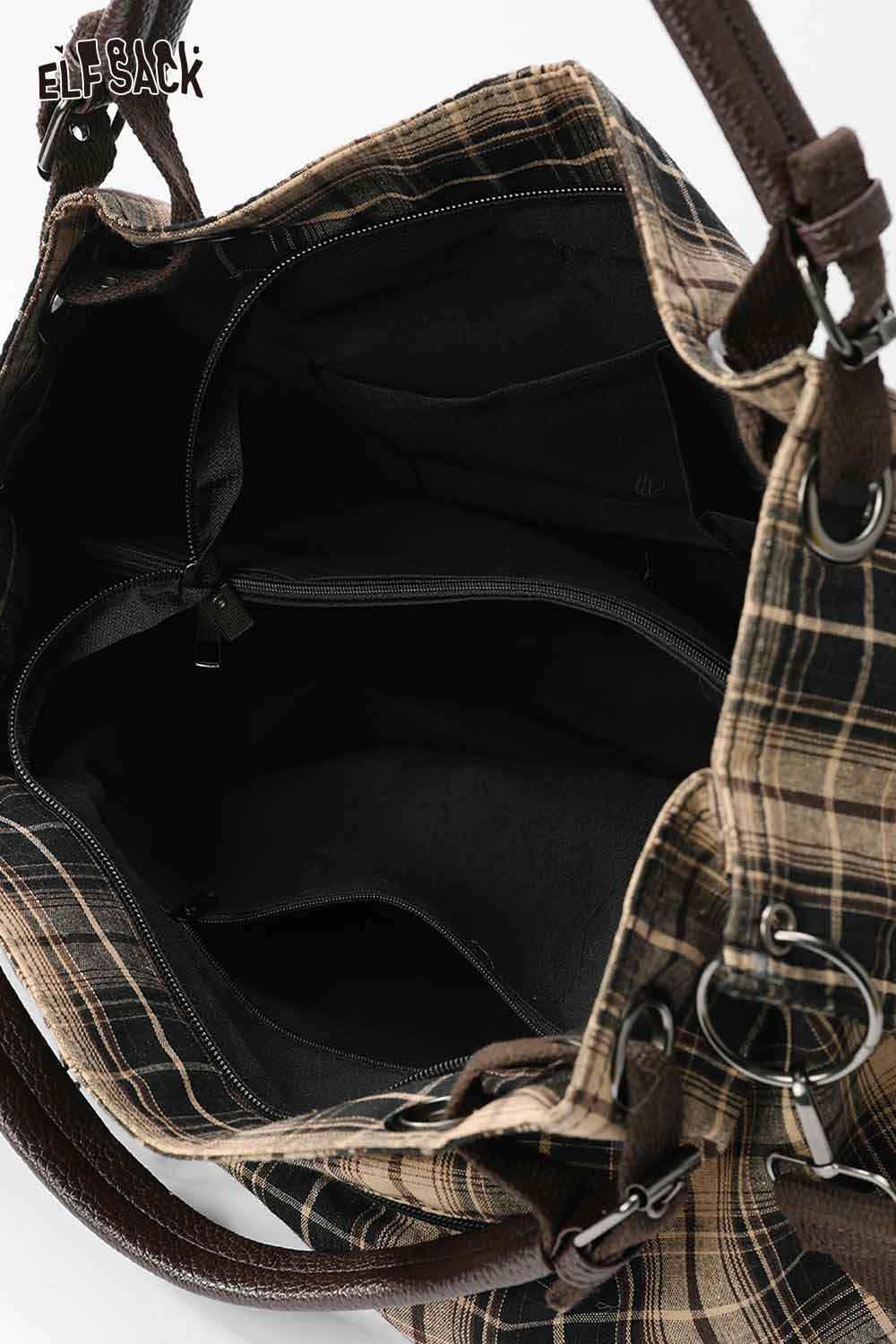 Interior view of ELFSACK minimalist striped crossbody tote bag with spacious compartments and pockets