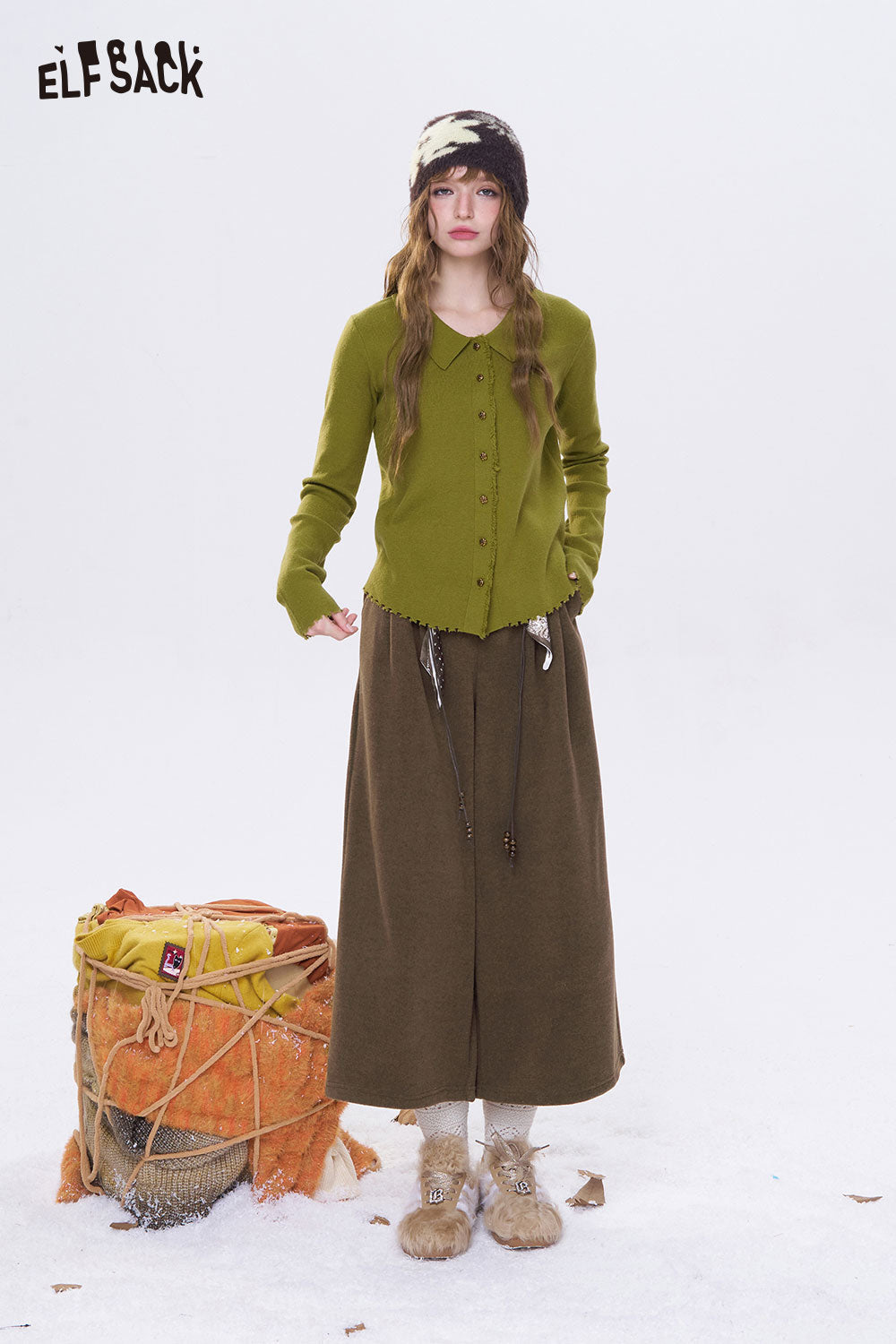 ELFSACK minimalist wide leg cropped pants styled with a green button-up cardigan and winter accessories