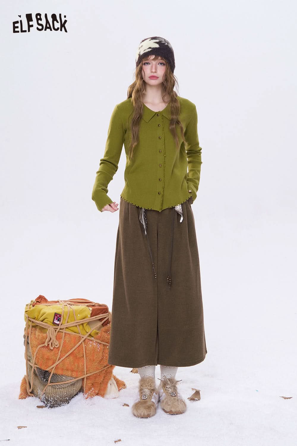 ELFSACK minimalist wide leg cropped pants styled with a green button-up cardigan and winter accessories