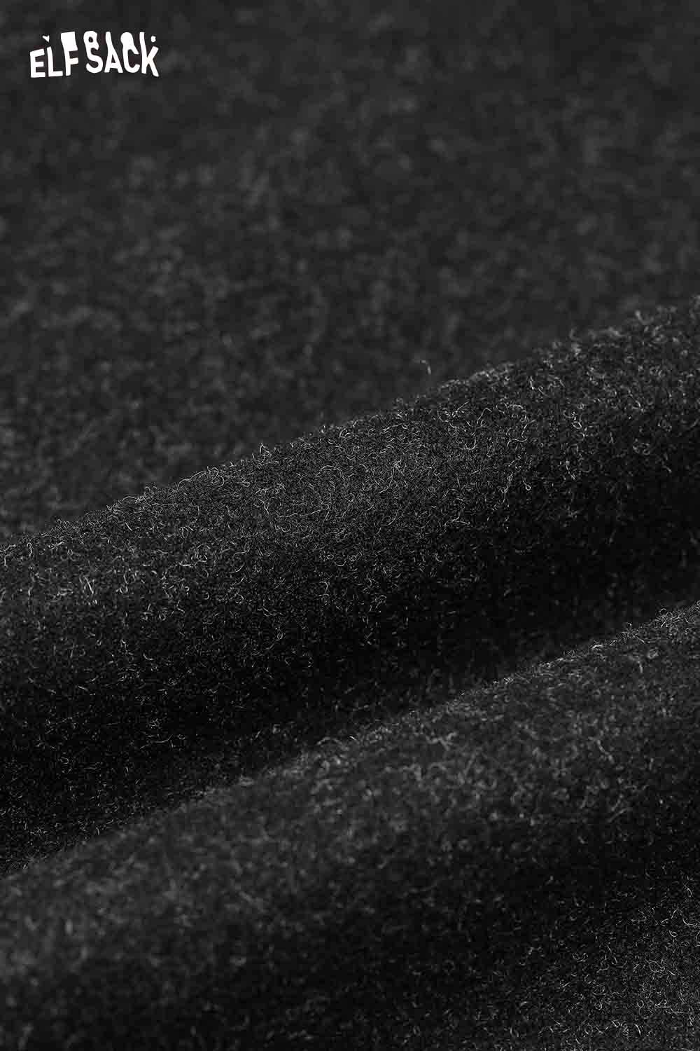 Close-up of soft black fabric texture for minimalist wide leg pants women