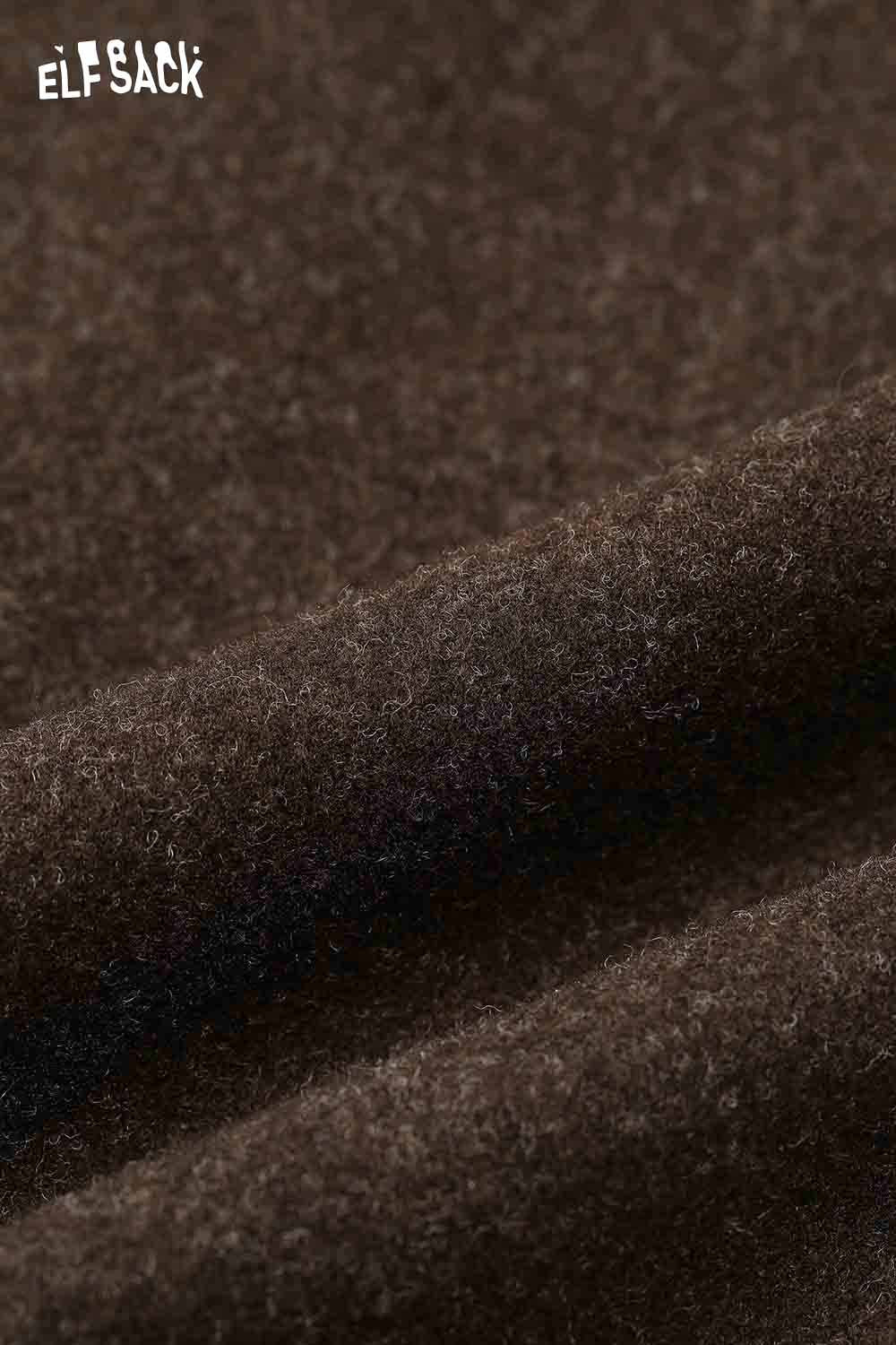 Close-up of soft fabric of ELFSACK minimalist wide leg pants women in deep brown color