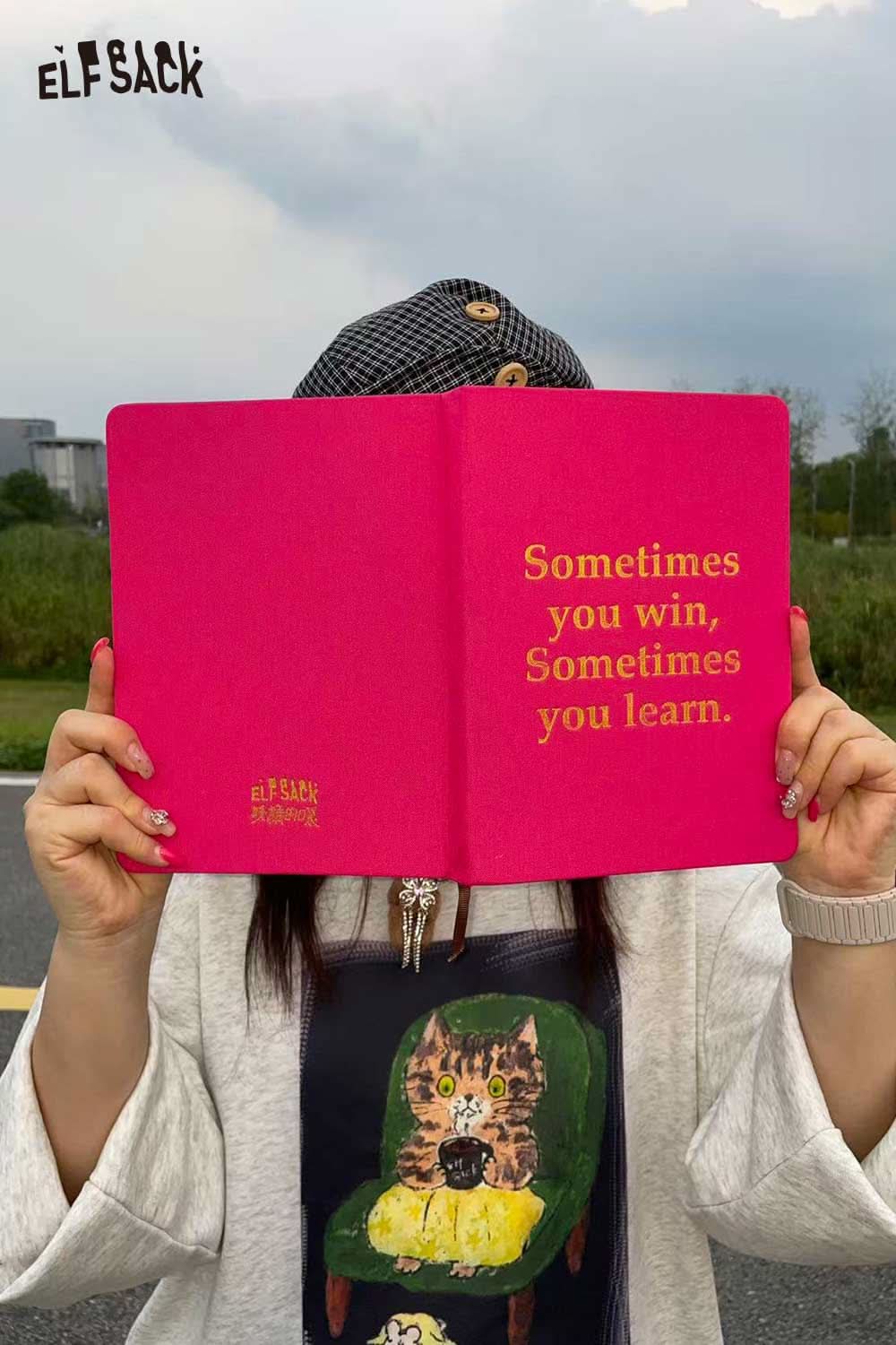 ELFSACK motivational quote hardcover notebook with a pink cover featuring an inspirational saying