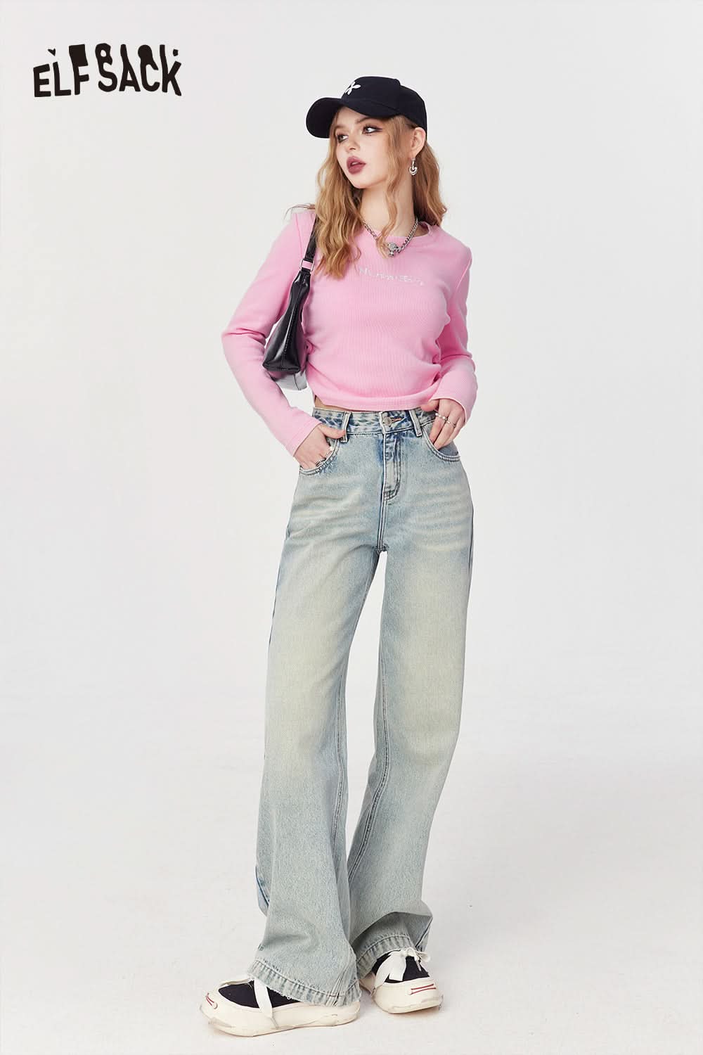 ELFSACK pink long sleeve T-shirt with Alphabet Embroidered detail worn with light blue wide-leg jeans