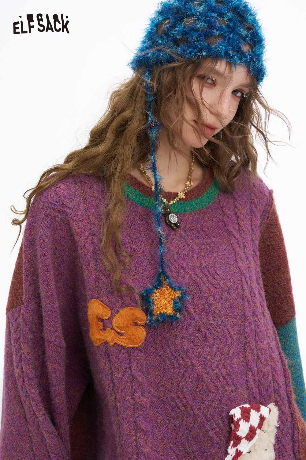 ELFSACK patchwork animal graphic sweater in vibrant colors with playful designs for a unique style
