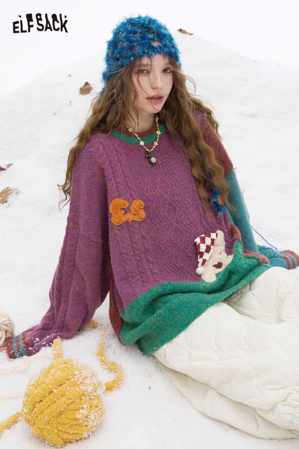 ELFSACK patchwork animal graphic sweater in vibrant colors for a cozy winter look