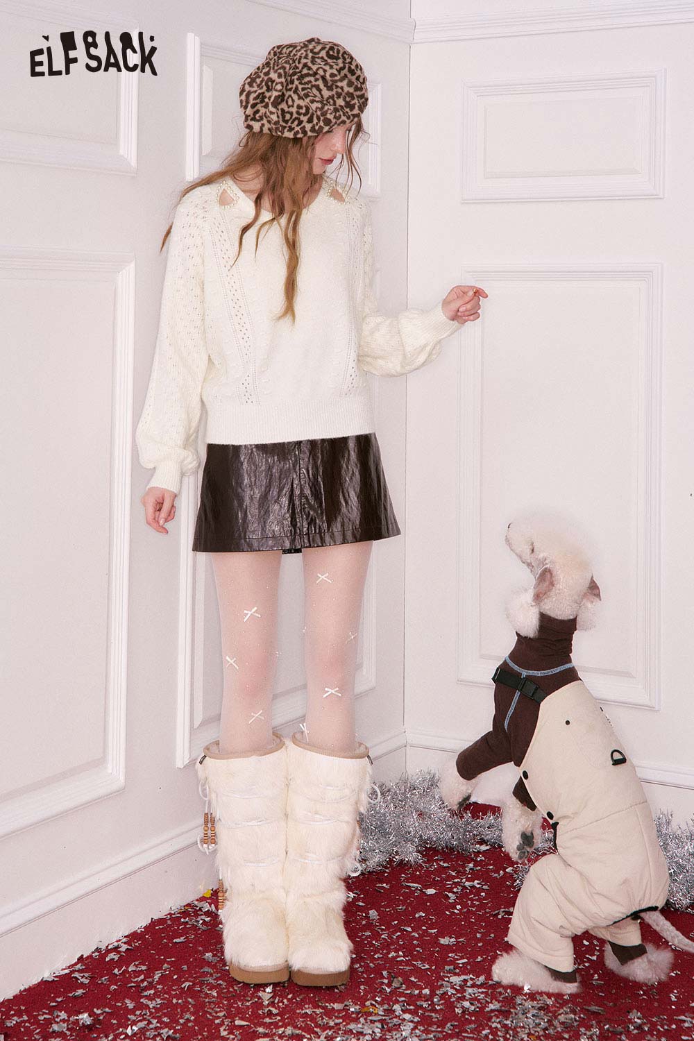 ELFSACK pearl embellished cropped sweater in white paired with a leather skirt for a chic winter look