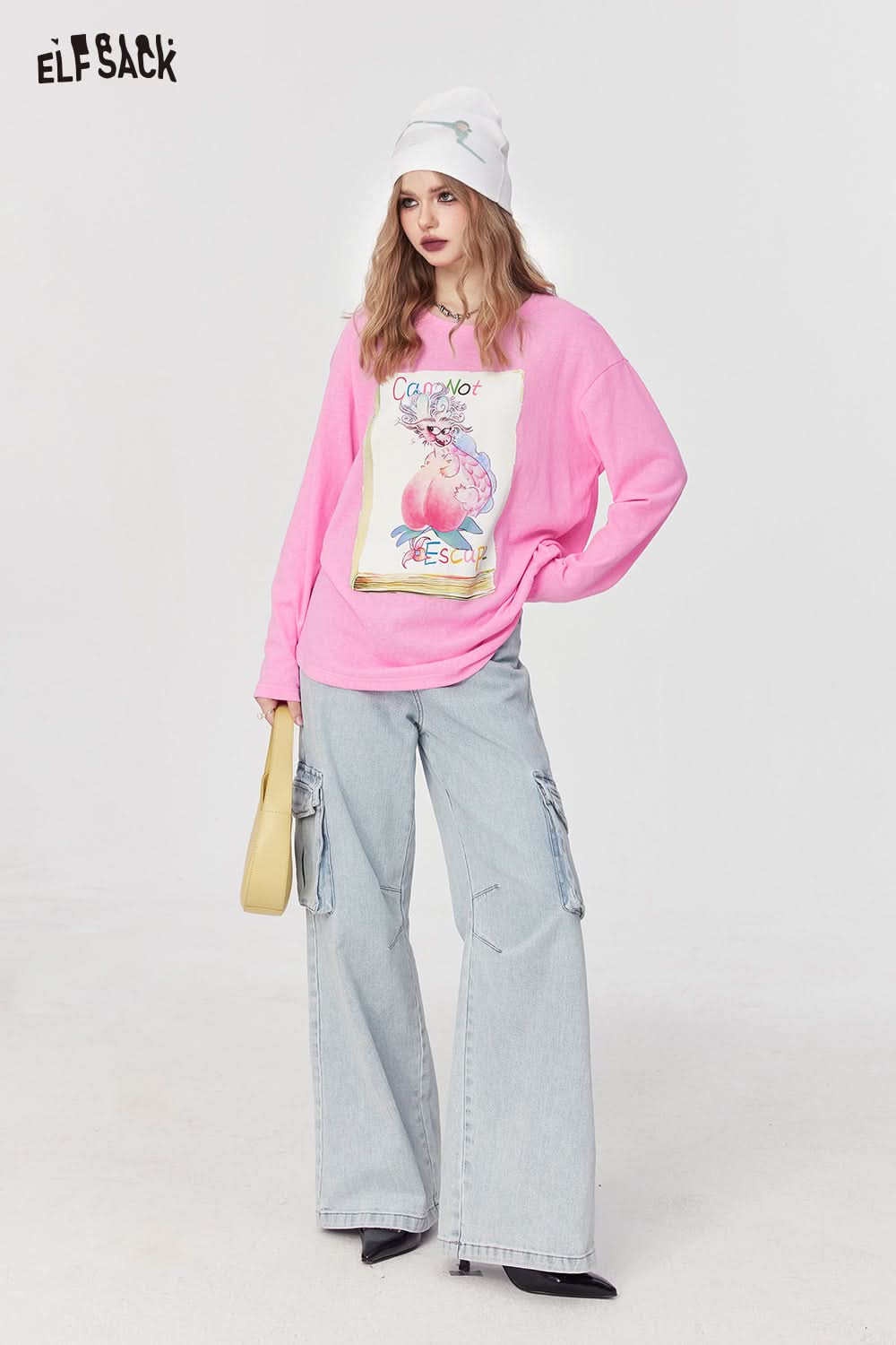 ELFSACK pink graphic print T-shirt paired with light blue wide-leg cargo jeans and white beanie