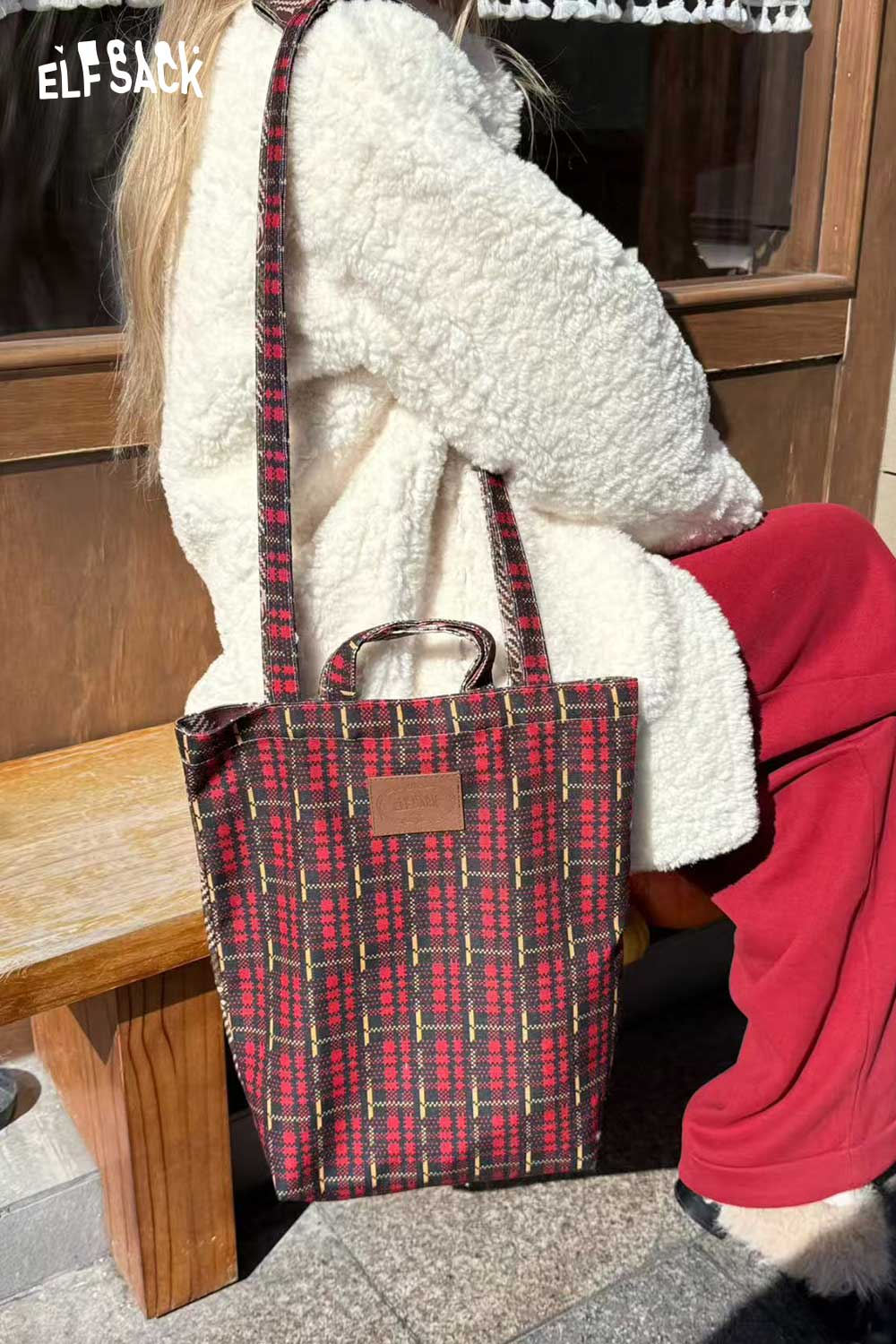 ELFSACK plaid cartoon crossbody bag featuring a stylish design and comfortable straps for everyday use