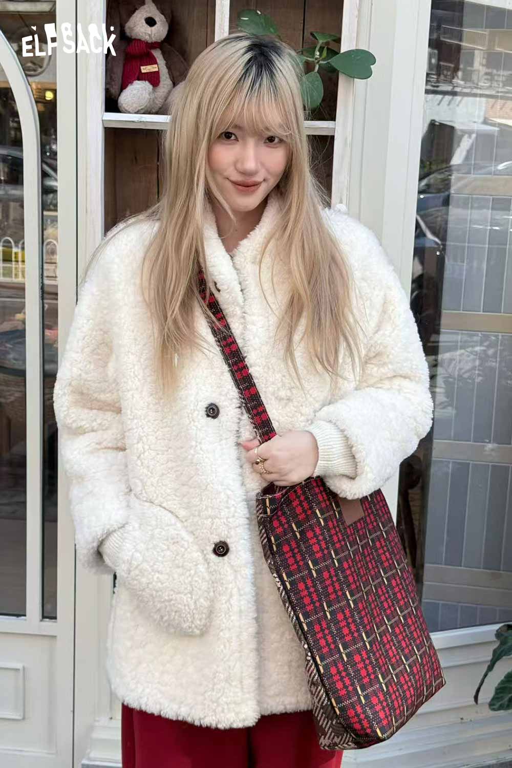 ELFSACK plaid cartoon crossbody bag worn with a cozy white oversized jacket, perfect for stylish outings