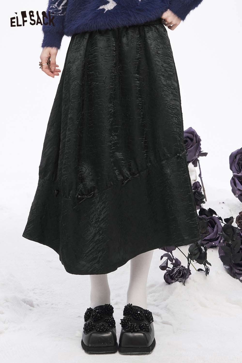ELFSACK pleated A-line long skirt in dark green with textured fabric and elegant design