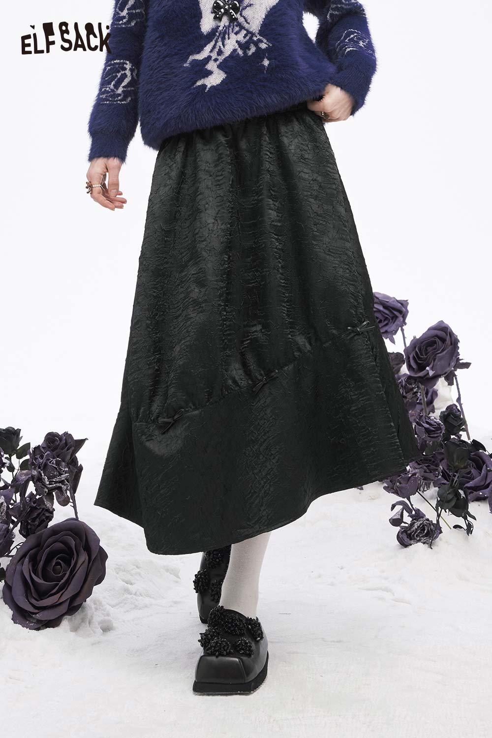 ELFSACK pleated A-line long skirt in black with a textured finish, perfect for stylish winter outfits