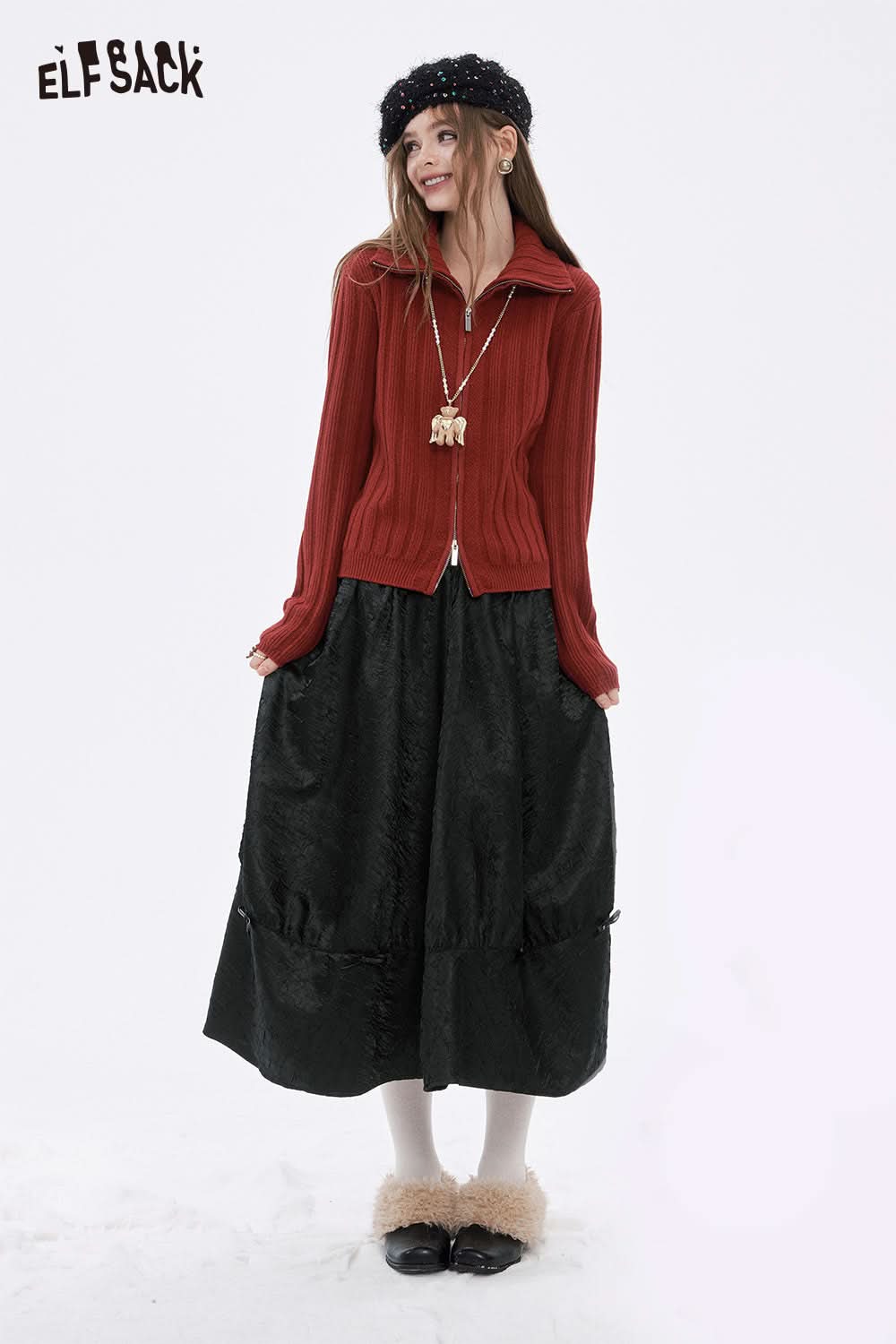 ELFSACK pleated A-line long skirt in black styled with a cozy red sweater and accessories