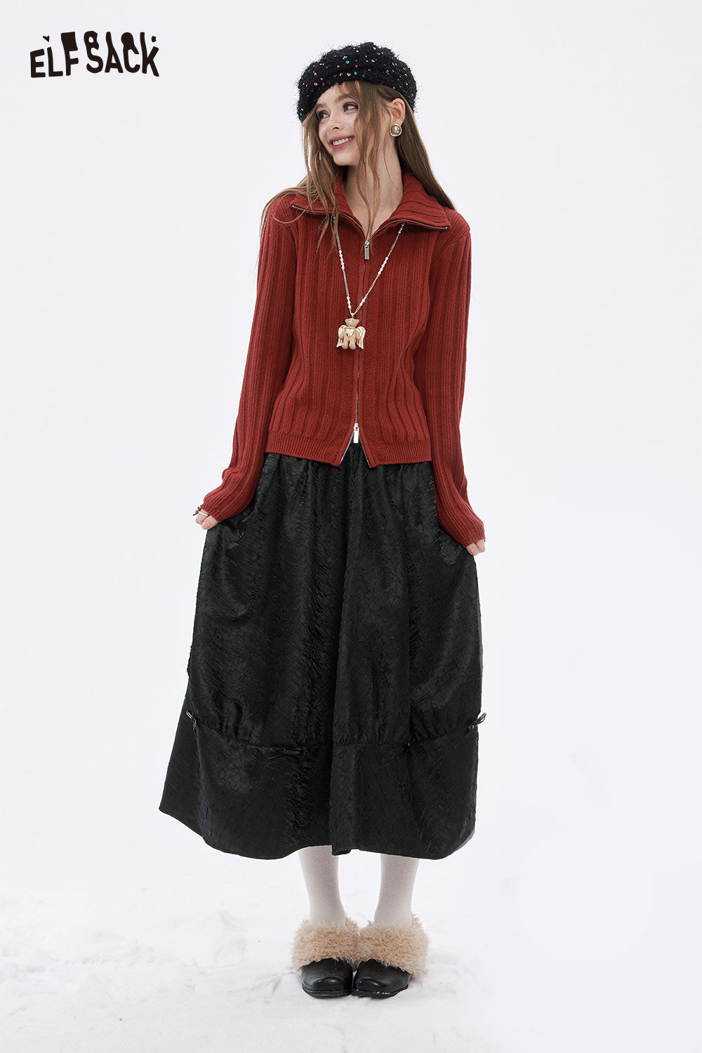 ELFSACK pleated A-line long skirt in black styled with a cozy red sweater and accessories