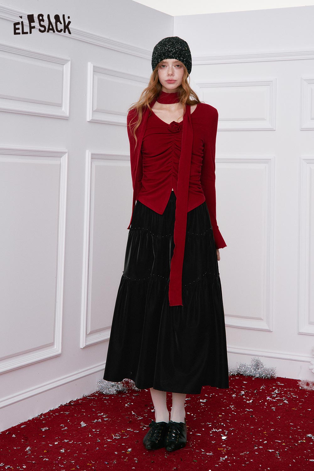 ELFSACK pleated PU leather maxi skirt styled with a red top and accessories for a chic look