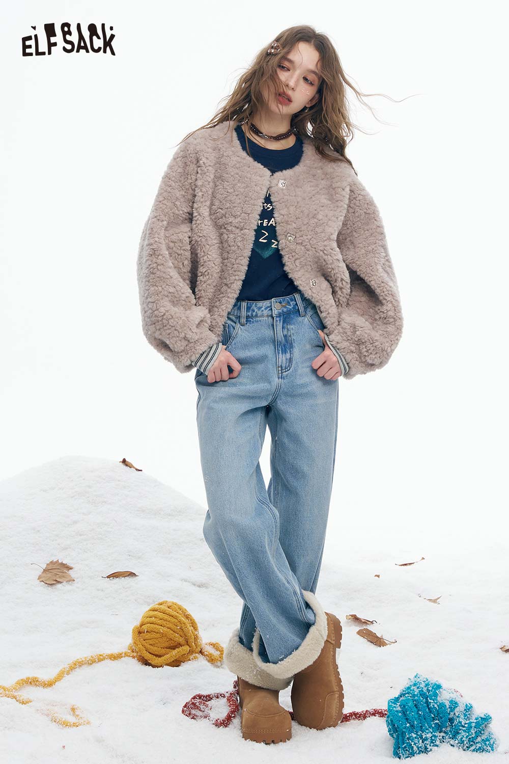 ELFSACK plush cuff straight jeans for women paired with a cozy faux fur jacket in a winter setting