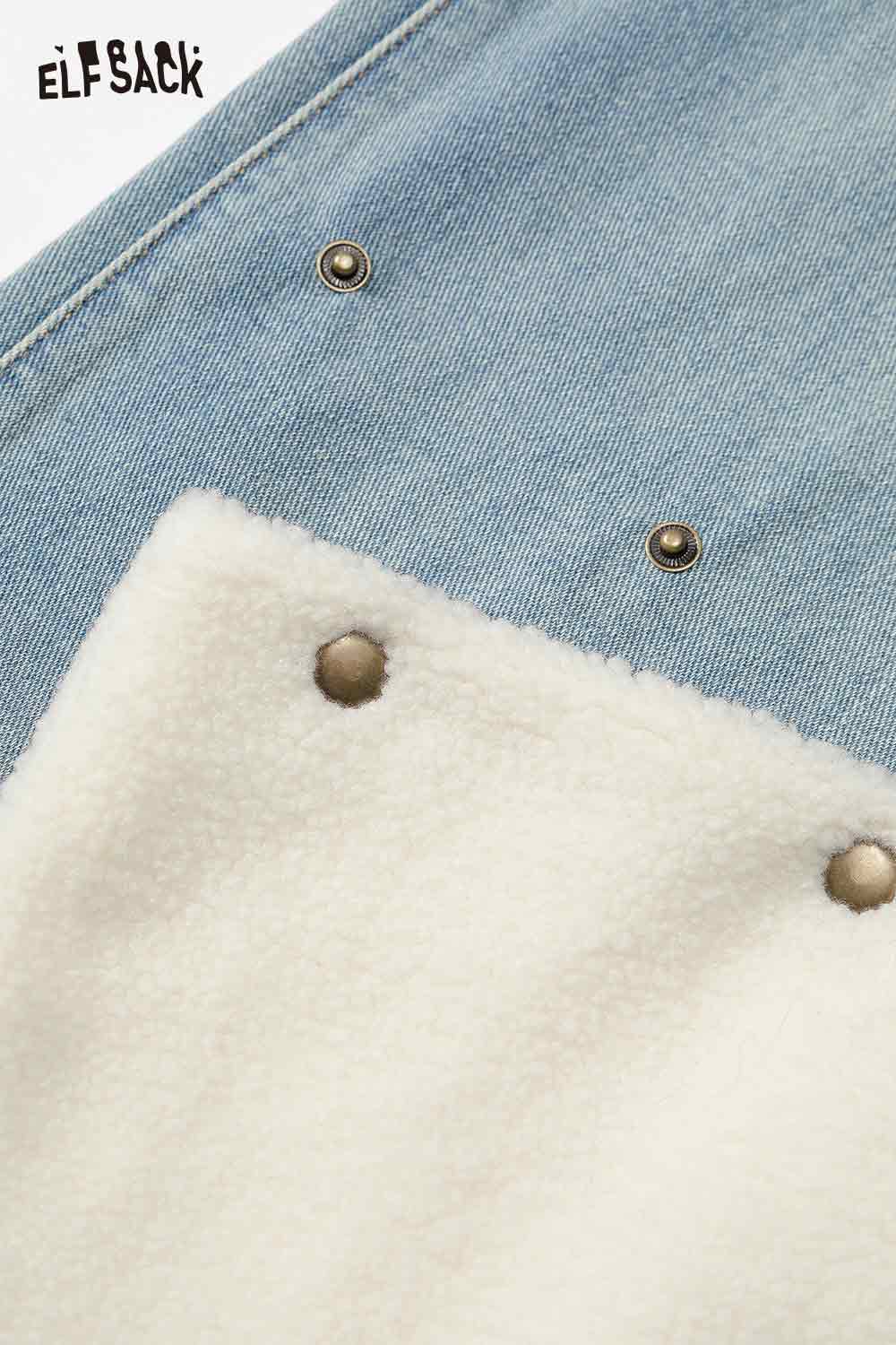 Close-up of ELFSACK plush hem patchwork jeans featuring fleece and metal details