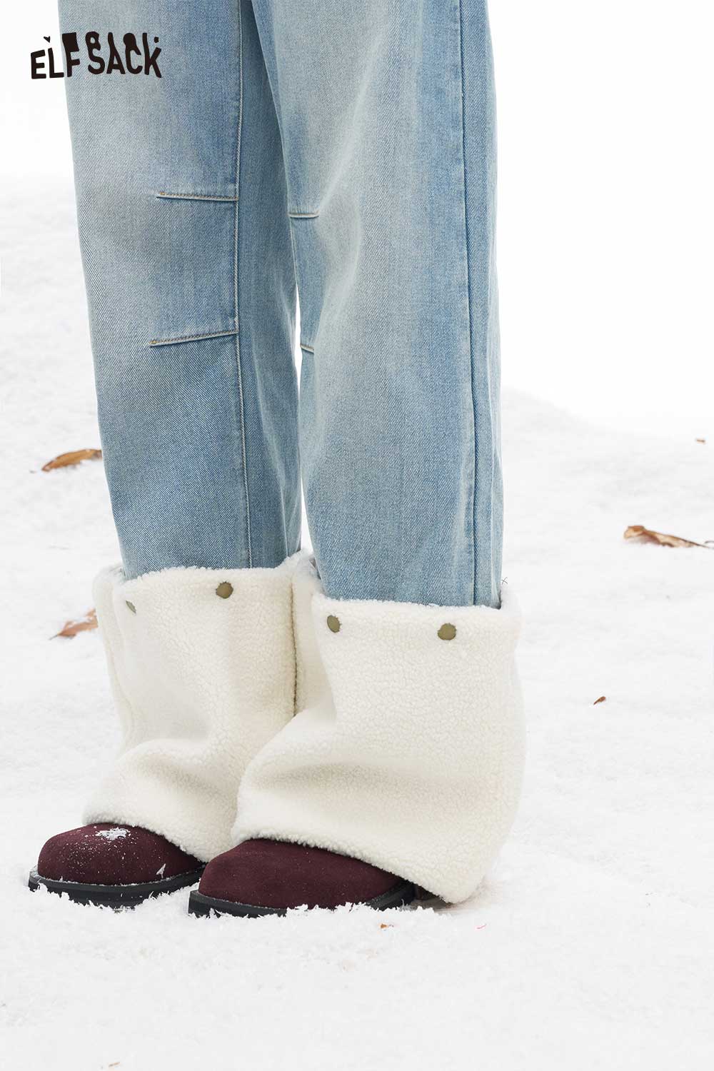ELFSACK plush hem patchwork jeans designed for comfort and style in snowy conditions