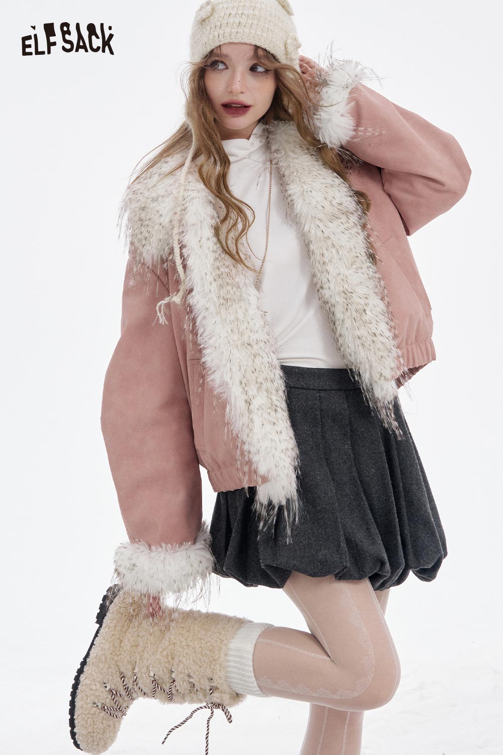 ELFSACK plush lining toggle button coat in pink with a fluffy collar, styled with a skirt and winter accessories