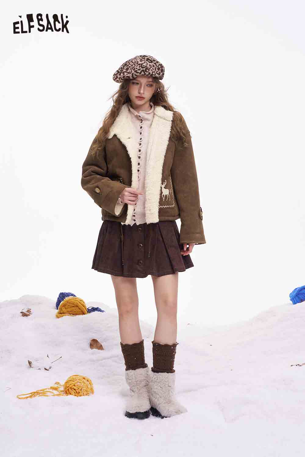 ELFSACK preppy deer graphic coat in brown with faux fur collar, styled with a skirt and beret