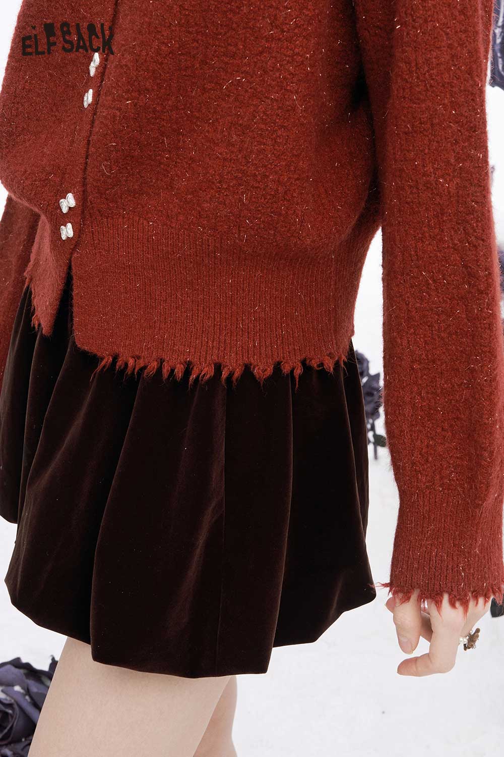 ELFSACK preppy fringe sweater for women in red paired with a black skirt for a stylish look