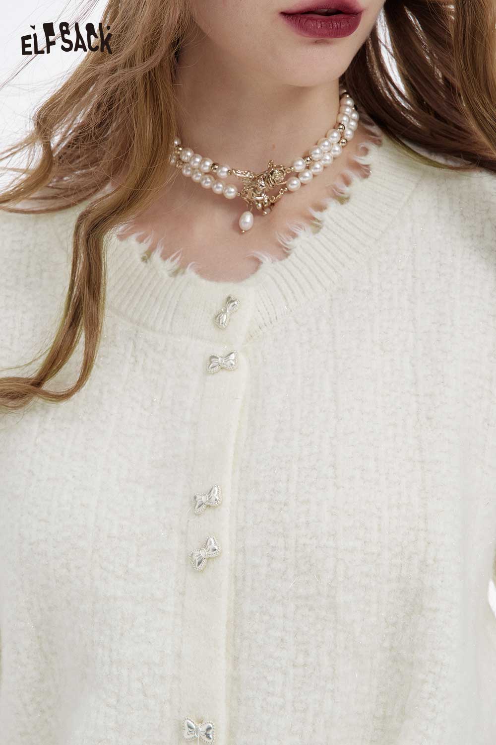 ELFSACK preppy fringe sweater for women in ivory with decorative buttons and elegant detail