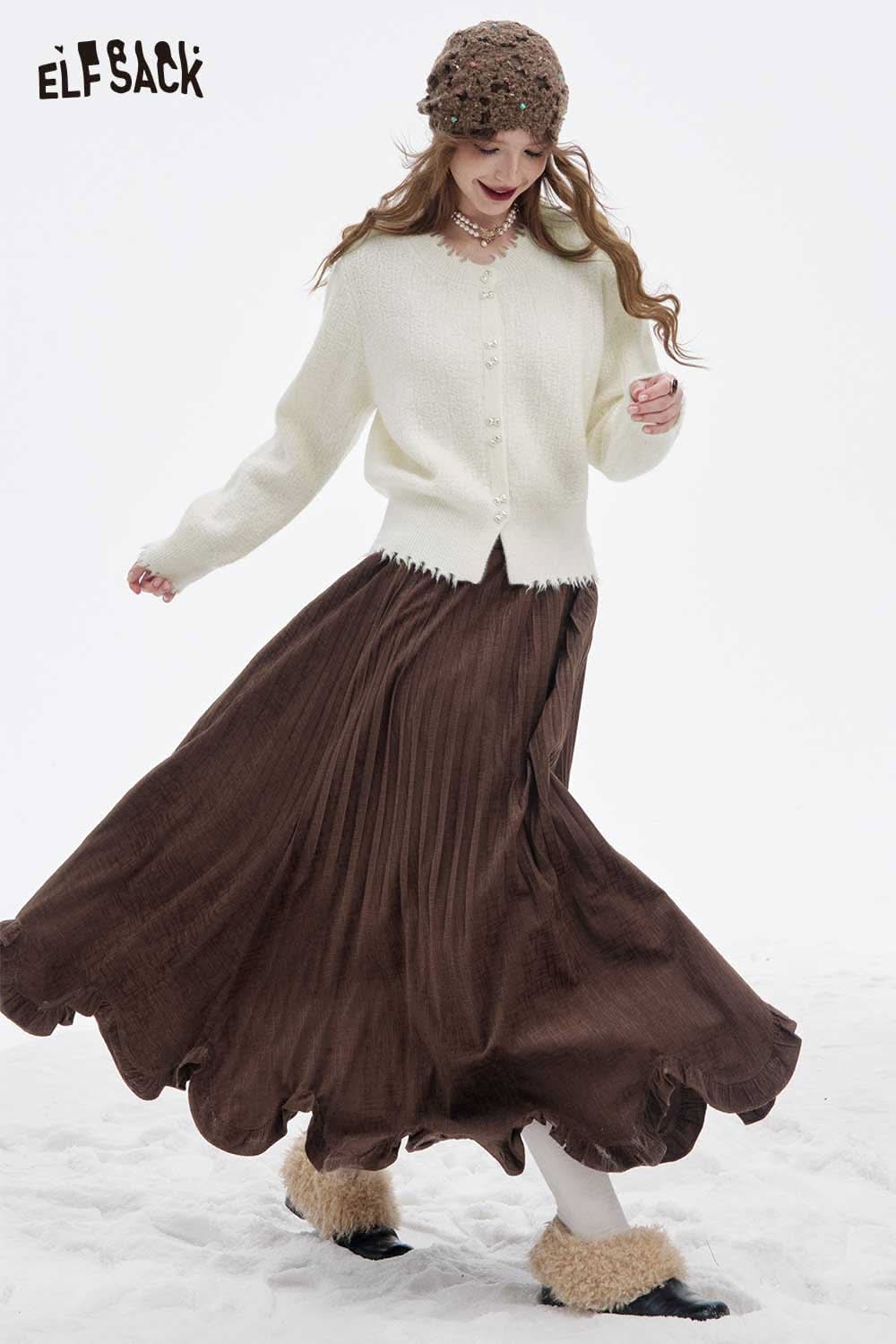 ELFSACK preppy fringe sweater for women, styled with a flowy brown skirt and accessories