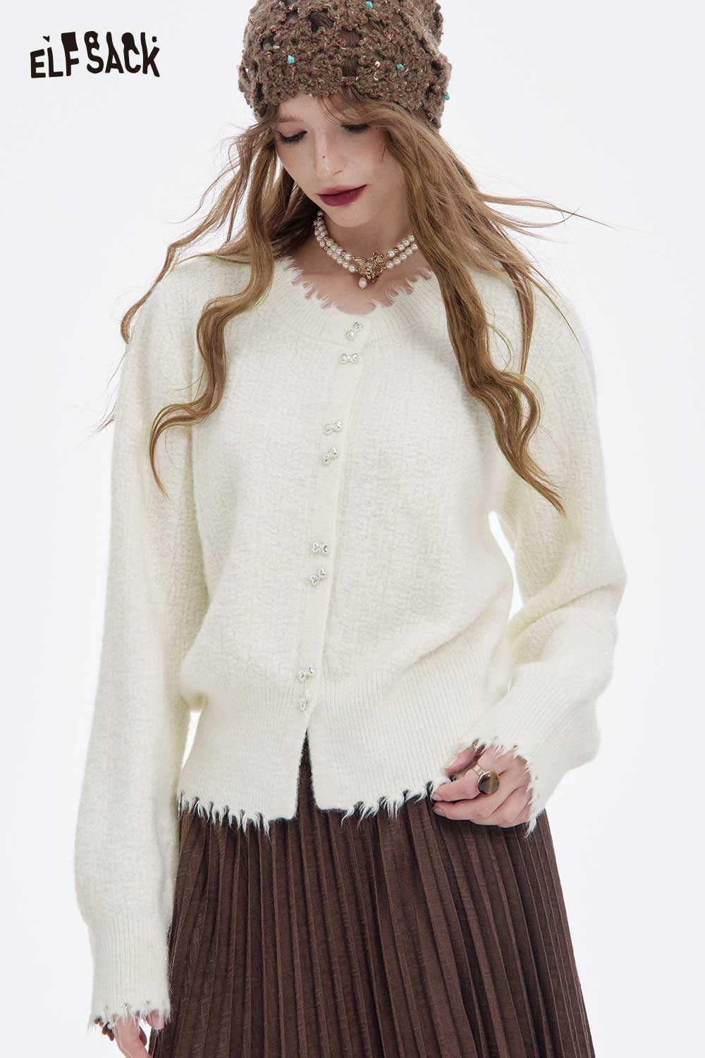 ELFSACK preppy fringe sweater for women in cream color with button closure and stylish frayed edges