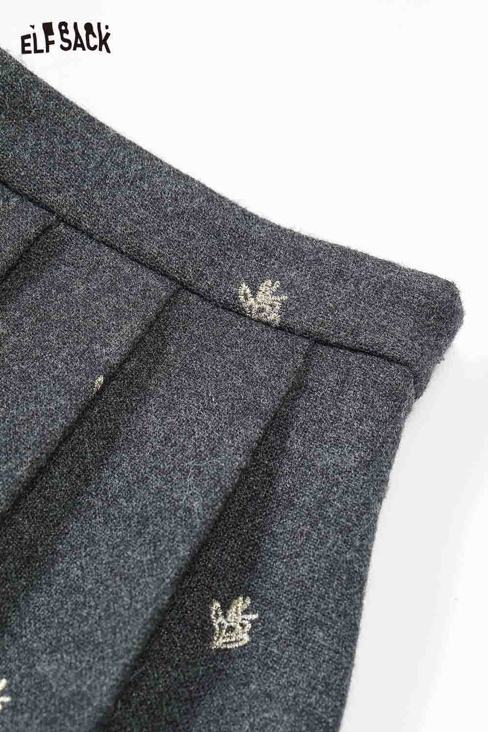 Close-up of the ELFSACK preppy jacket skirt set for women featuring a pleated design and embroidered details.