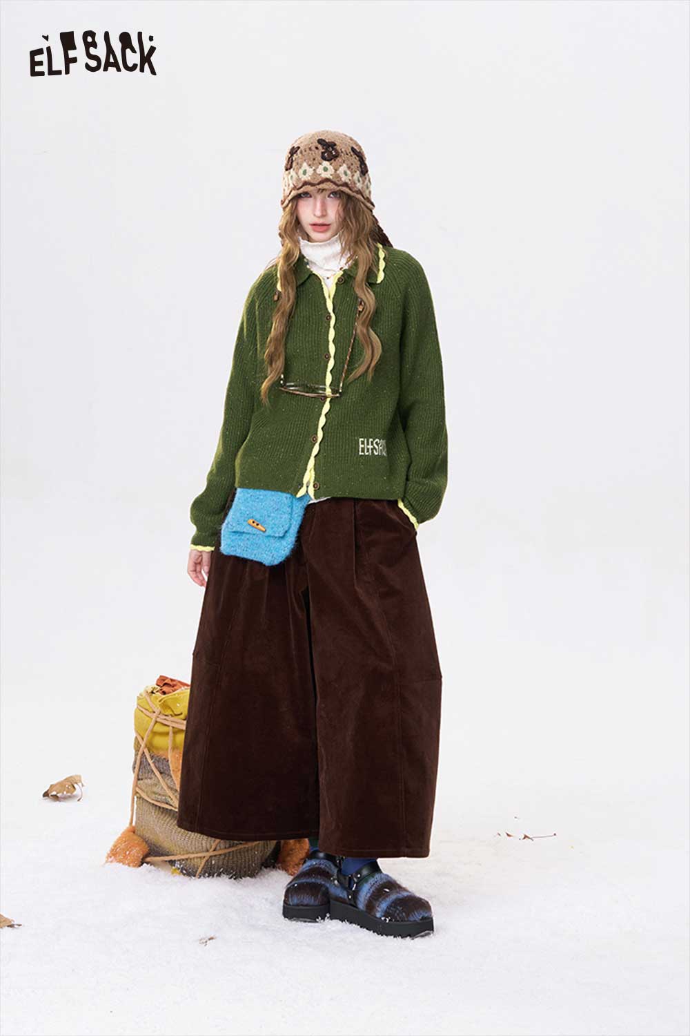 ELFSACK preppy knit cardigan for women in green paired with wide-leg brown pants and stylish accessories