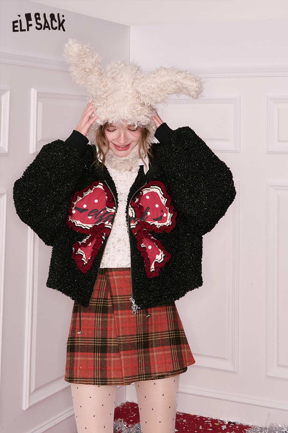 ELFSACK preppy red plaid culottes skirt styled with a fuzzy black jacket and bunny hat