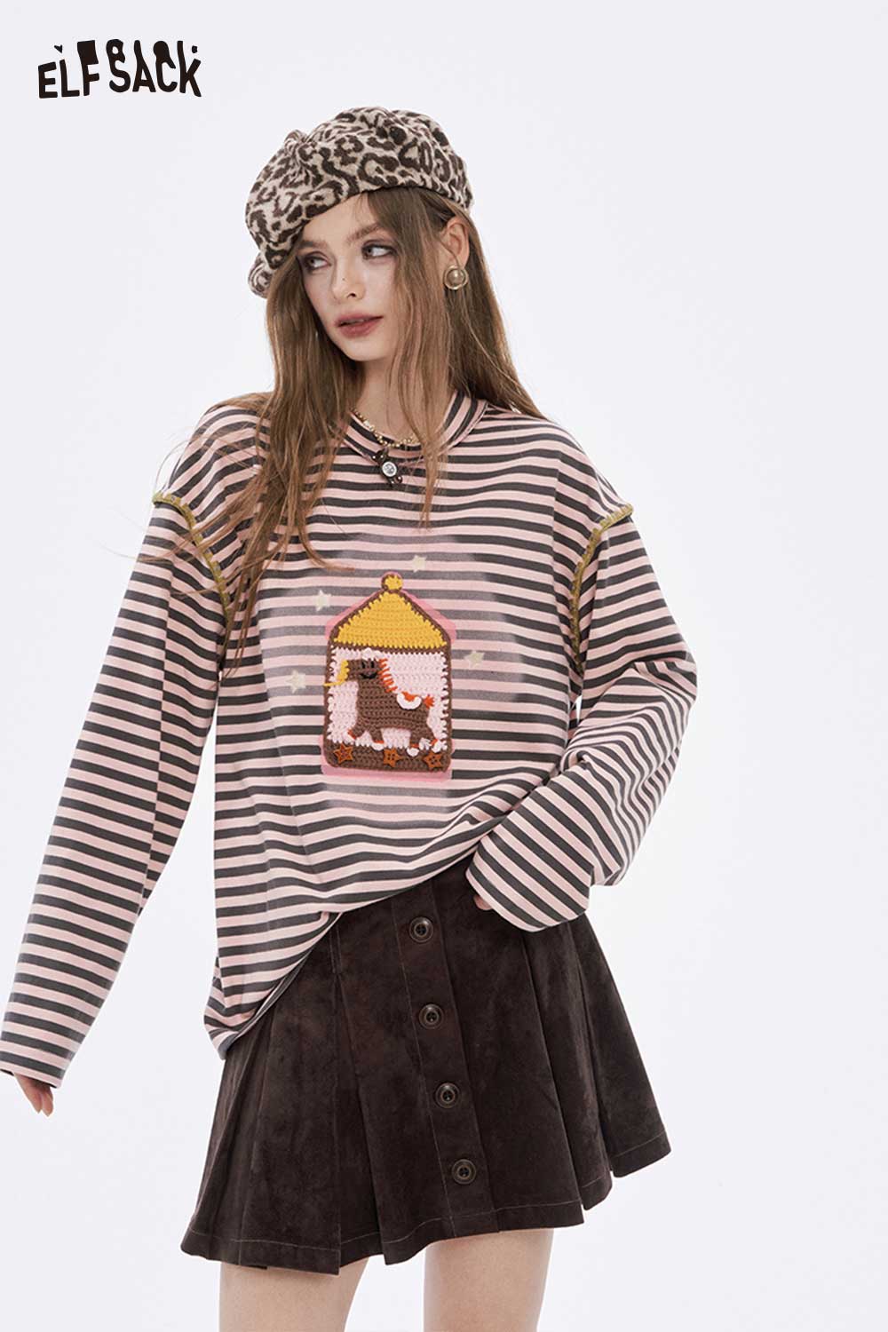 ELFSACK preppy striped graphic t-shirt for women featuring a playful animal design on a pink striped background