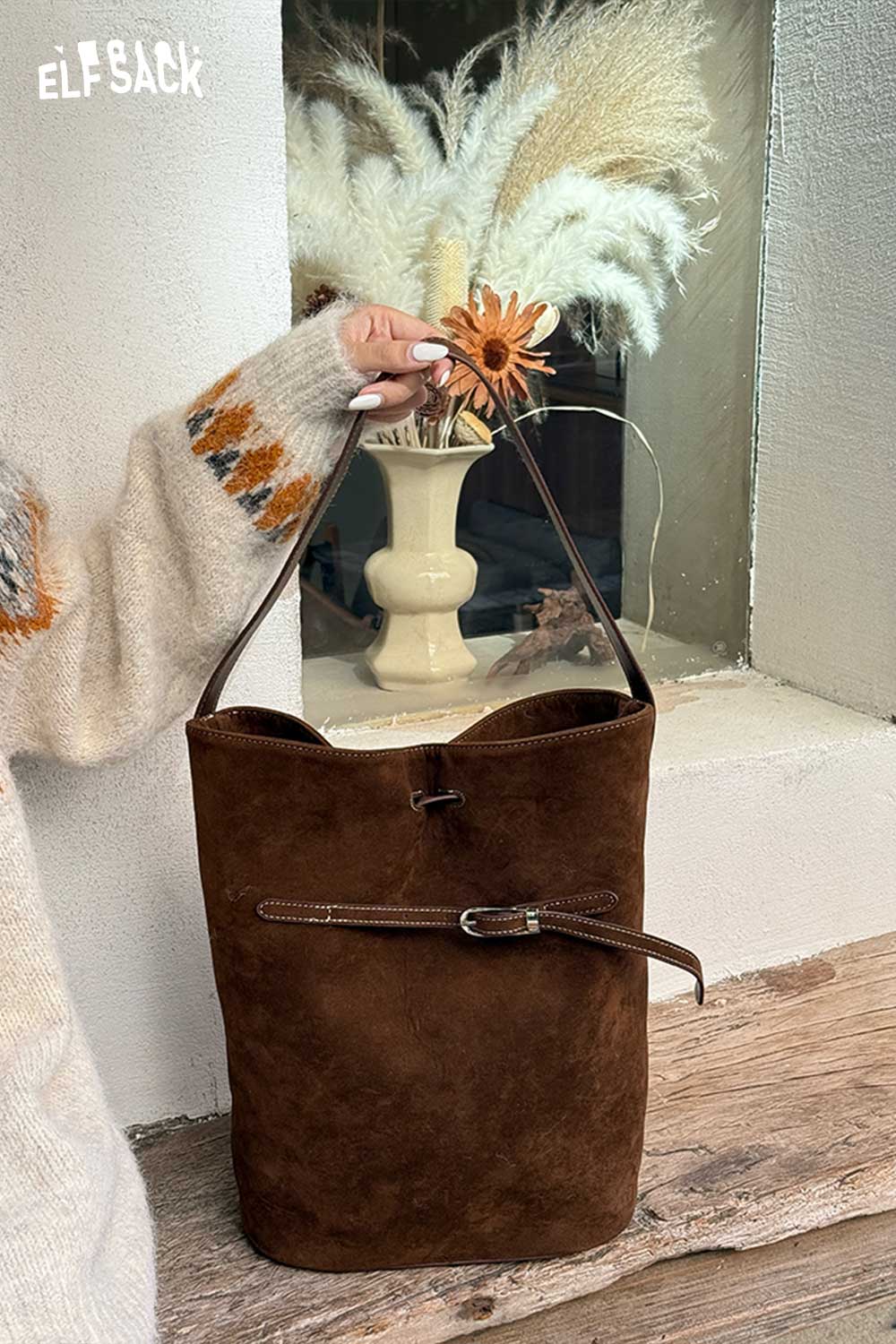 ELFSACK brown PU leather bucket bag for women with adjustable strap and stylish design