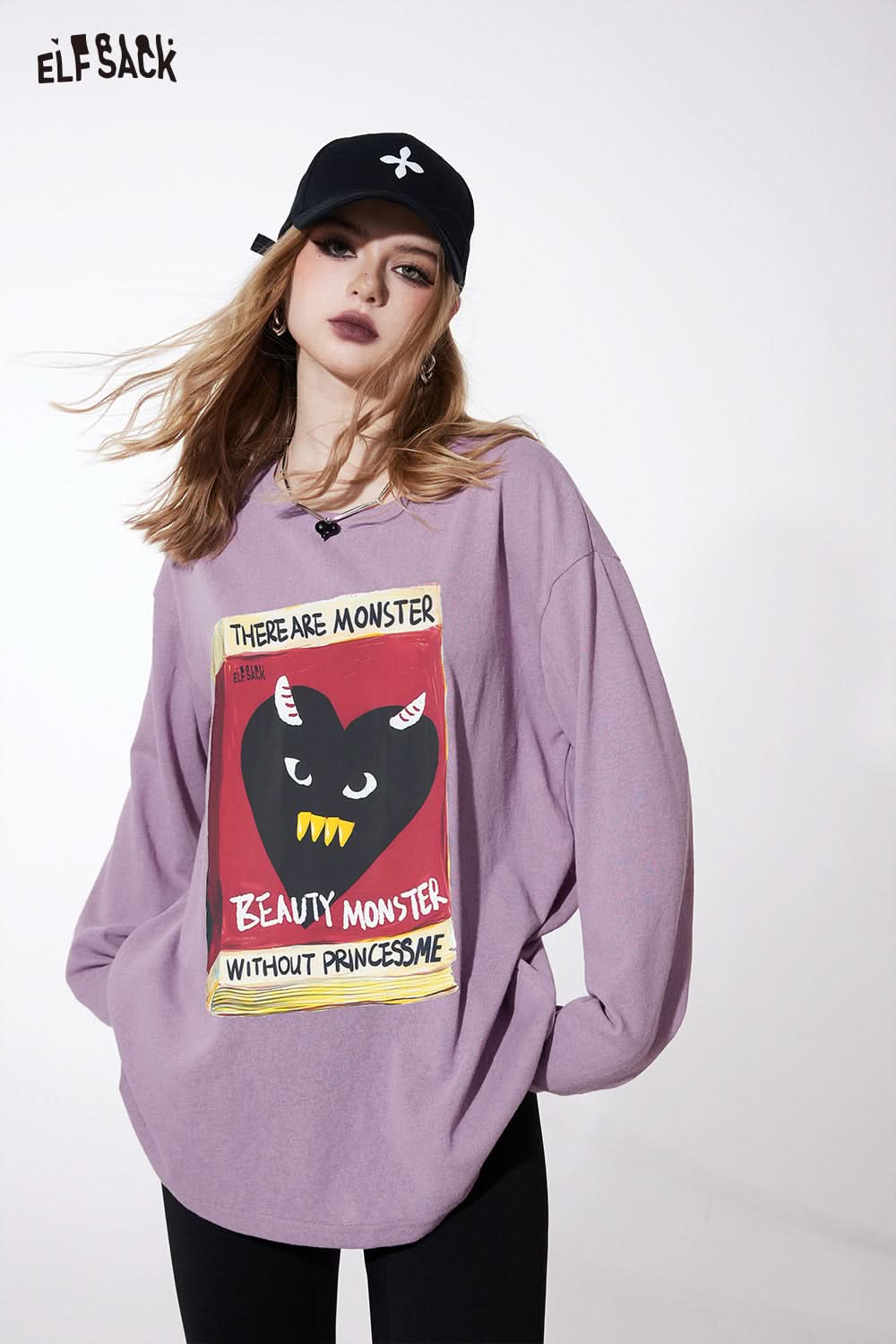 ELFSACK oversized lavender t-shirt with bold graphic print of a black heart and text design