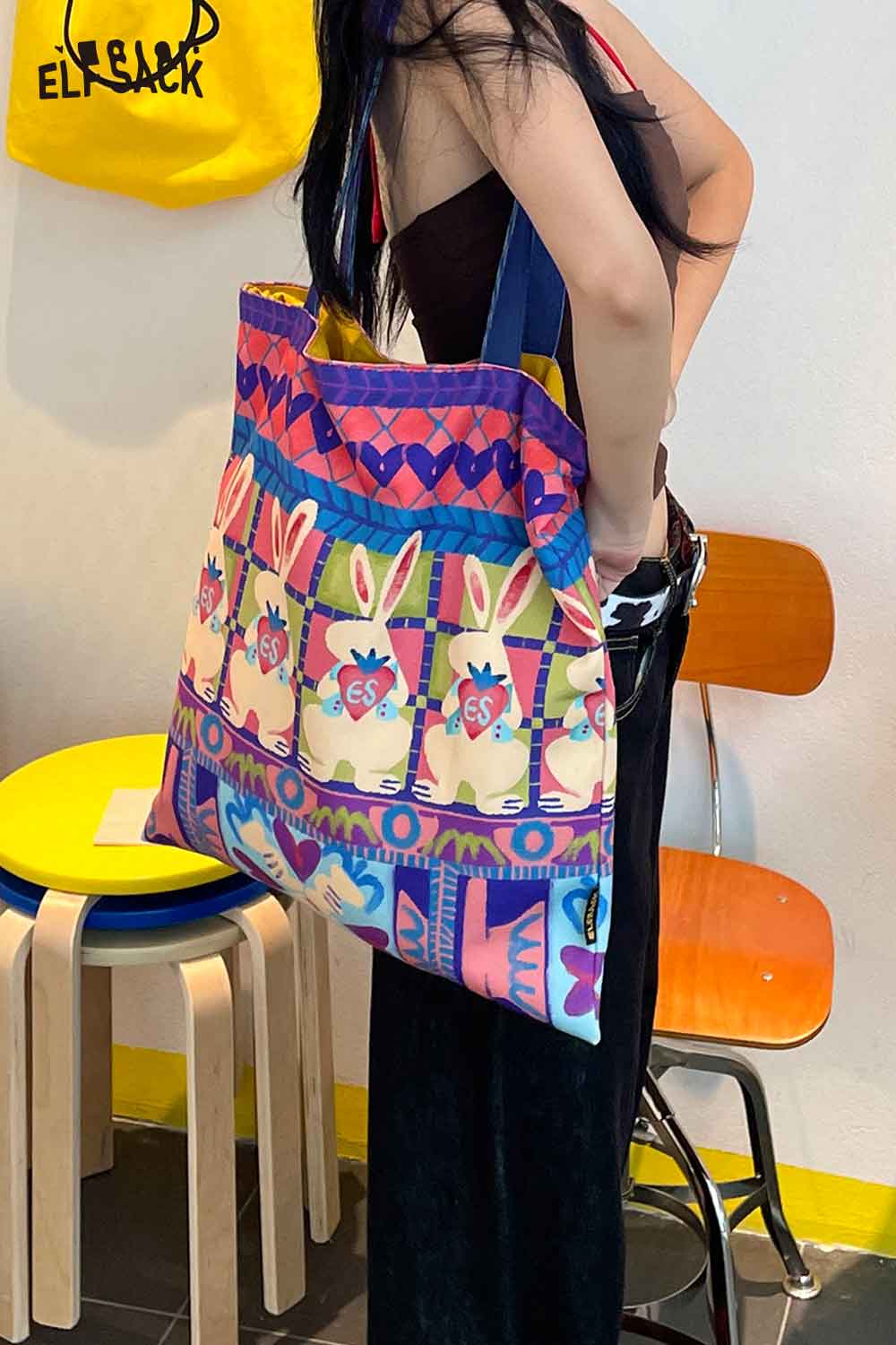 ELFSACK rabbit graphic tote bag with colorful bunny designs and sturdy shoulder straps