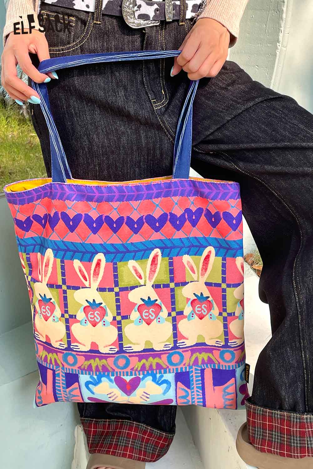 Colorful ELFSACK rabbit graphic tote bag featuring playful bunny design and sturdy handles