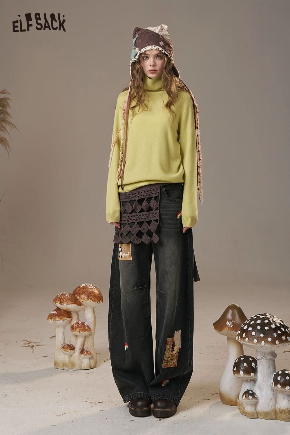 ELFSACK rainbow embroidery wide leg jeans styled with a cozy sweater and unique accessories