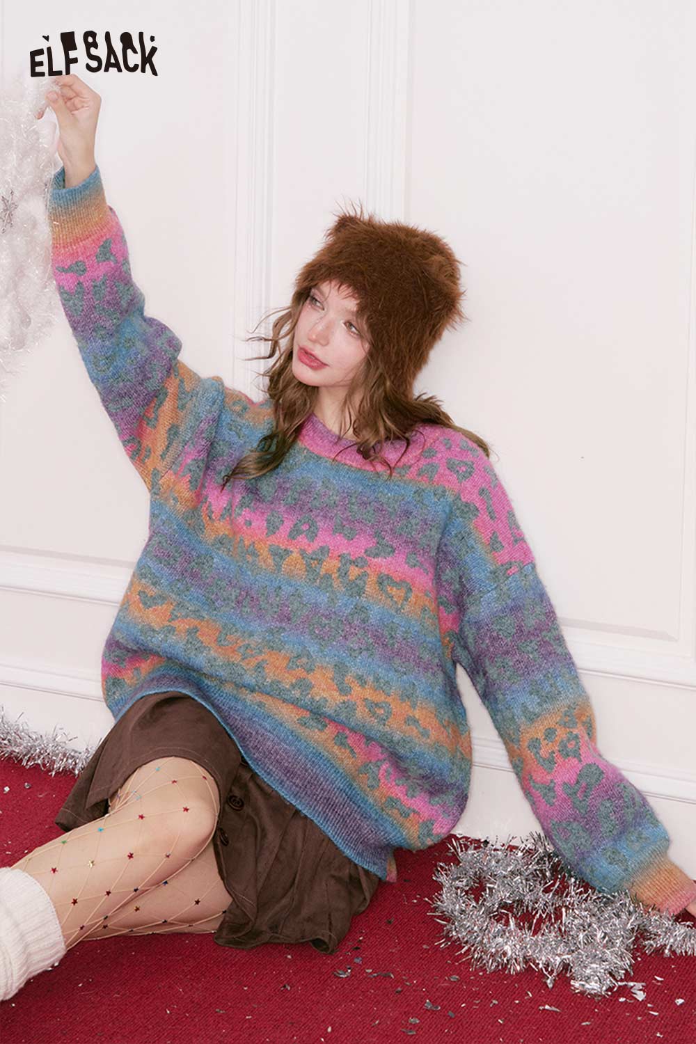 Cozy rainbow gradient sweater for women by ELFSACK with a relaxed fit and colorful pattern