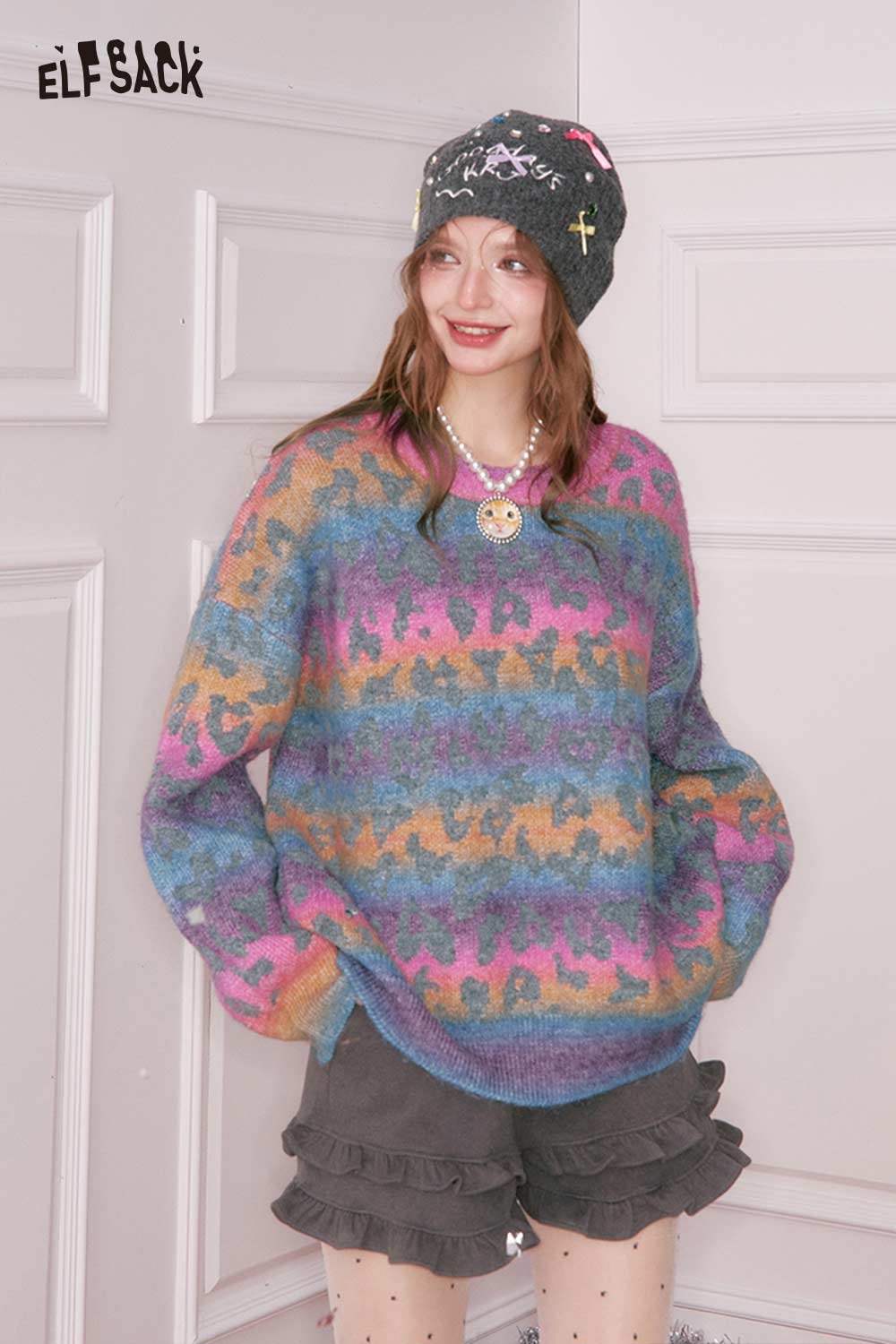 Cozy ELFSACK rainbow gradient sweater for women in vibrant colors, perfect for casual outfits
