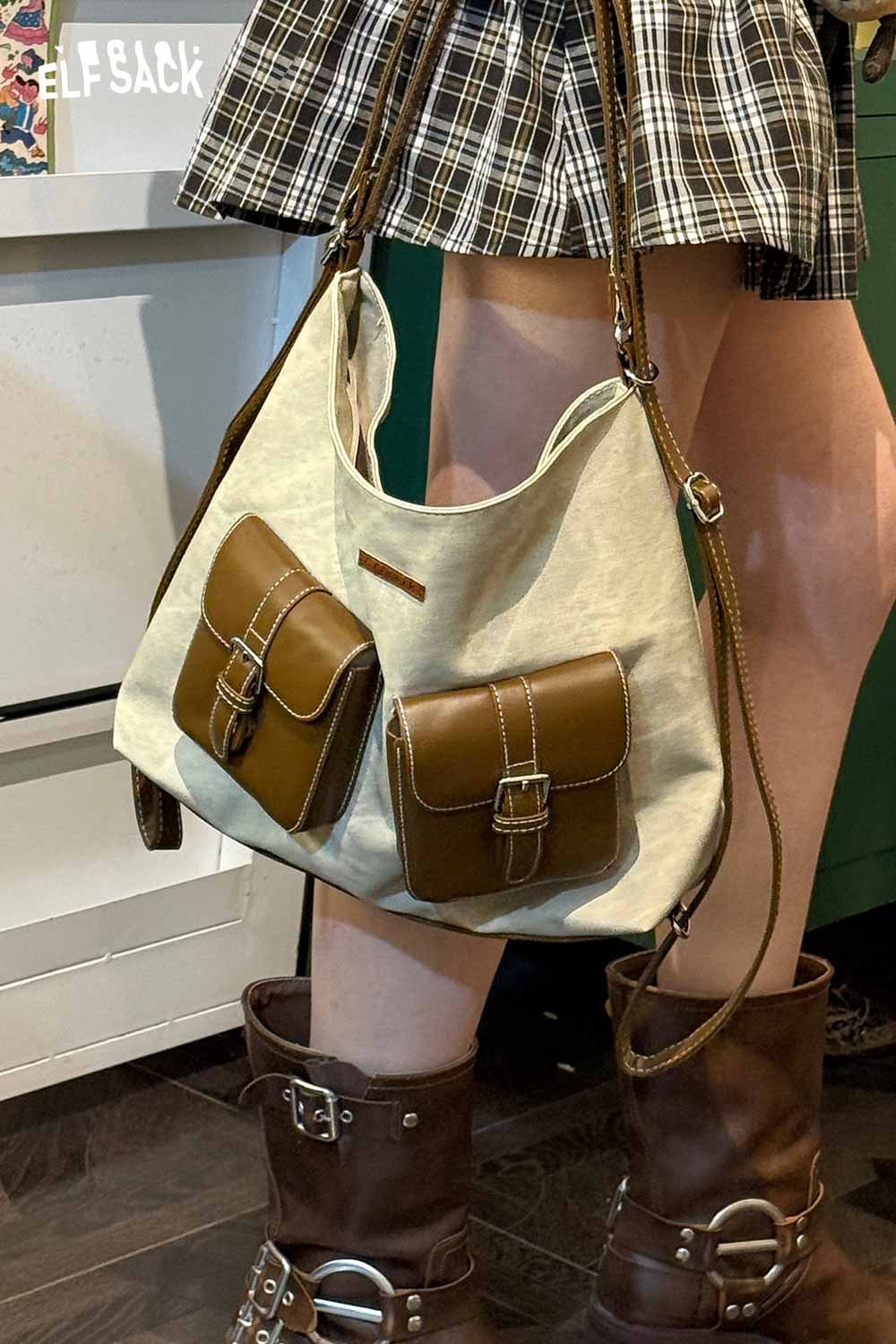 ELFSACK recycled faux leather crossbody bag with dual pockets, perfect for stylish everyday use