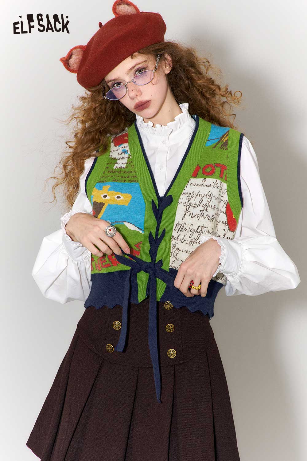 ELFSACK retro denim knit vest for women with colorful patterns and a trendy, vintage-inspired design