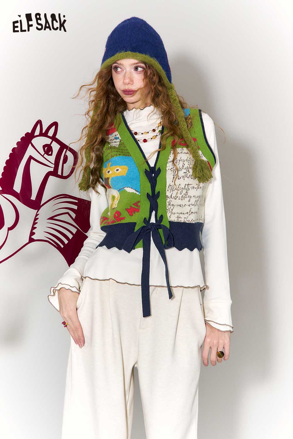 ELFSACK retro denim knit vest for women featuring colorful patterns and unique design elements