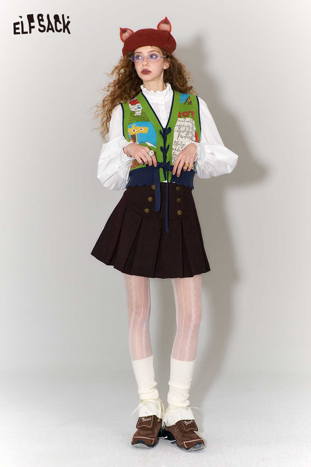 ELFSACK retro denim knit vest for women styled over a white blouse and pleated skirt