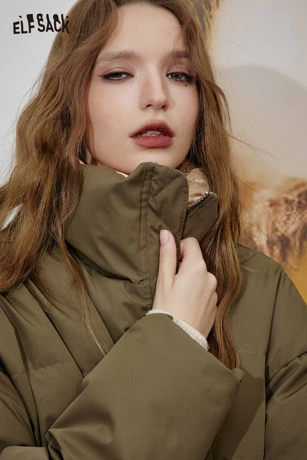 ELFSACK reversible cartoon graphic puffer coat in olive green with high collar for stylish warmth