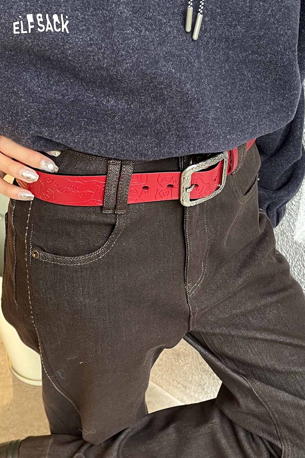 ELFSACK reversible rose pattern belt in red with a silver buckle styled with black jeans