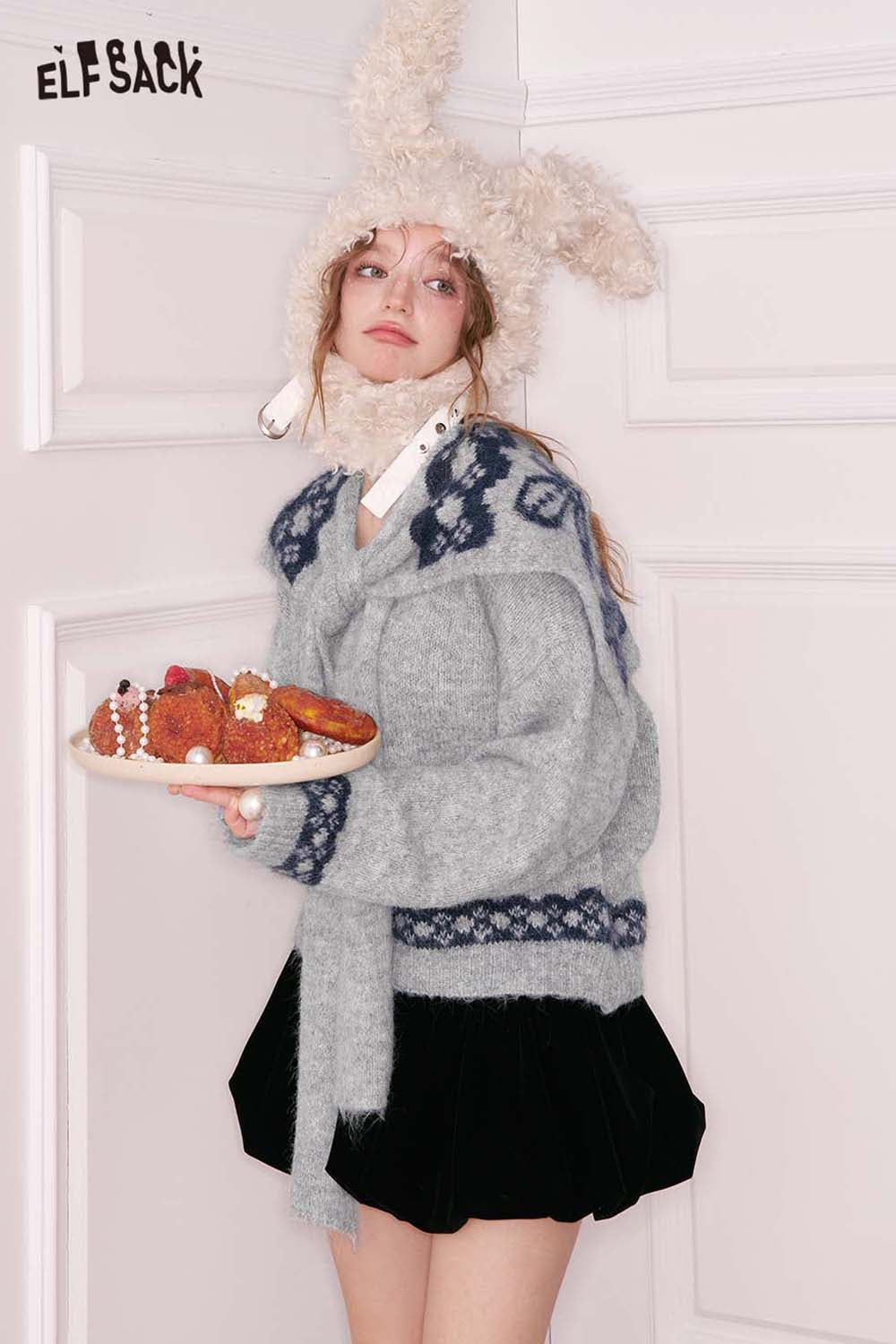 ELFSACK Sailor Collar Bow Sweater in gray with decorative patterns, paired with a black skirt