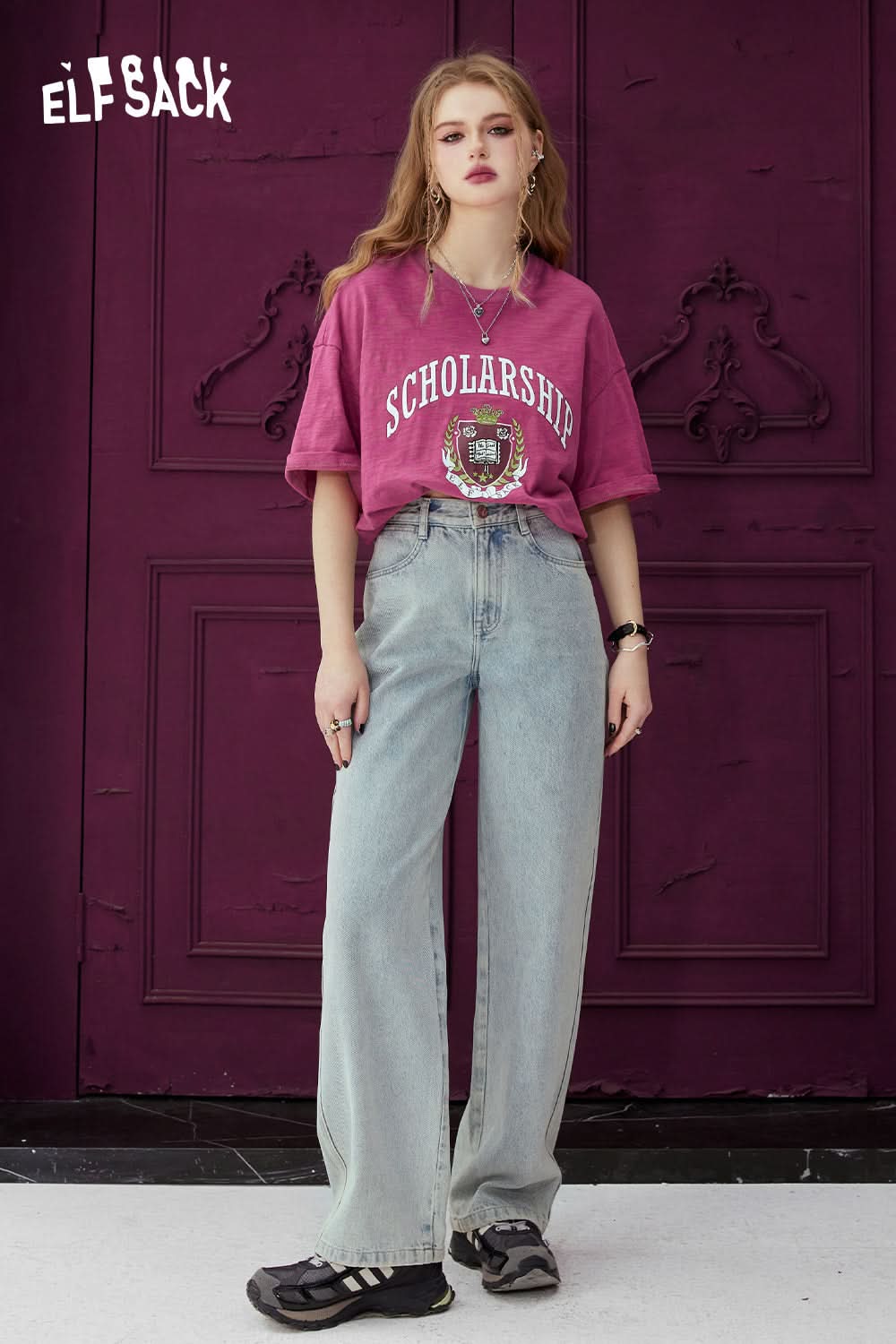 ELFSACK purple Graphic Print T-shirt with scholarship design paired with light wash wide-leg jeans