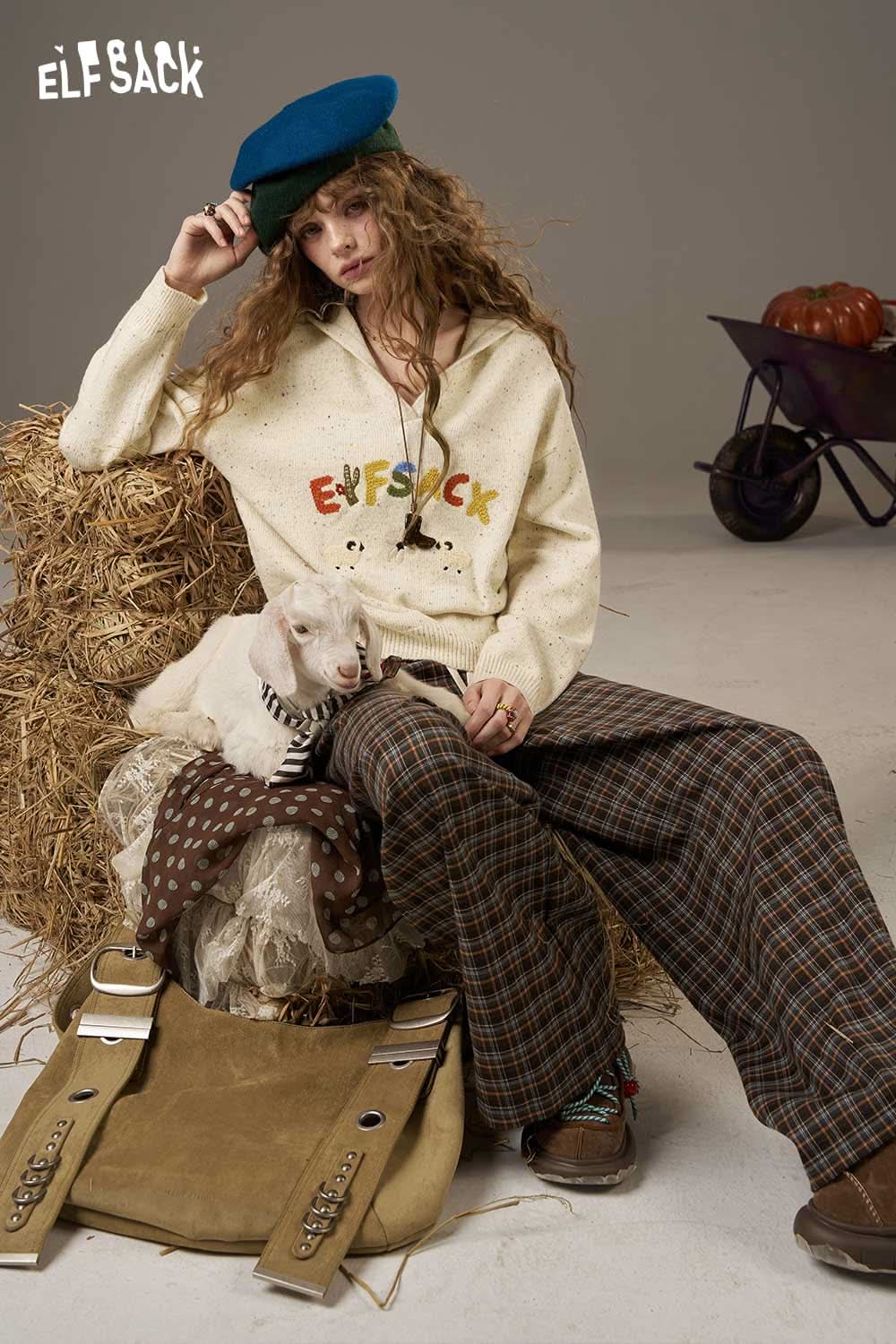 ELFSACK cute cartoon sheep sweater for women, styled with plaid pants and accessories, perfect for a cozy look
